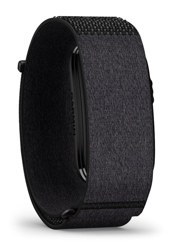 Czarny tracker fitness Garmin z tkany elastycznym paskiem na białym tle.