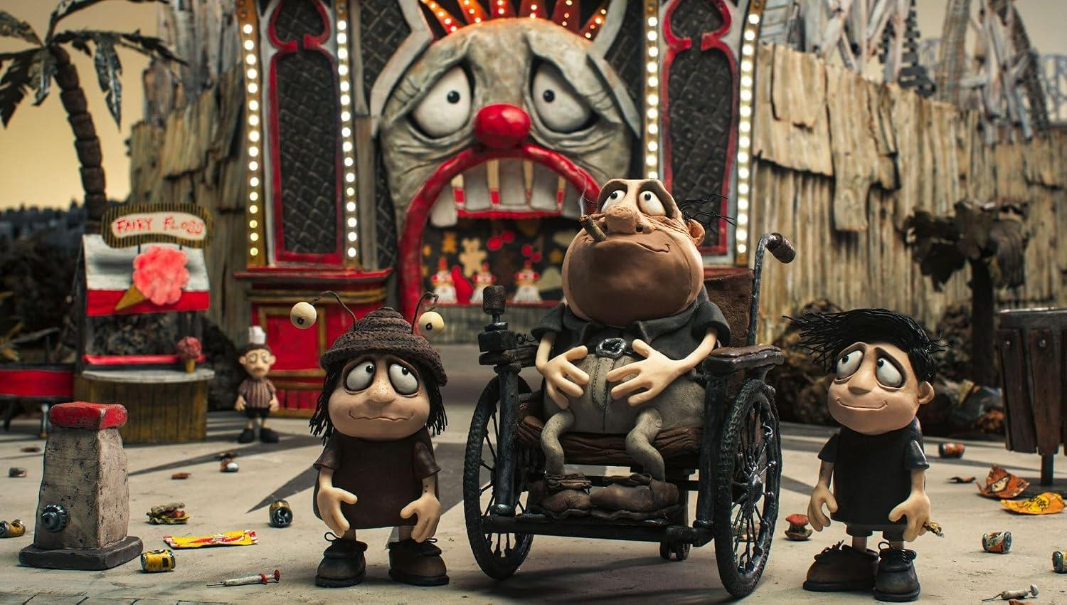 Stop-Motion-Figuren vor einem clownsförmigen Gebäude.