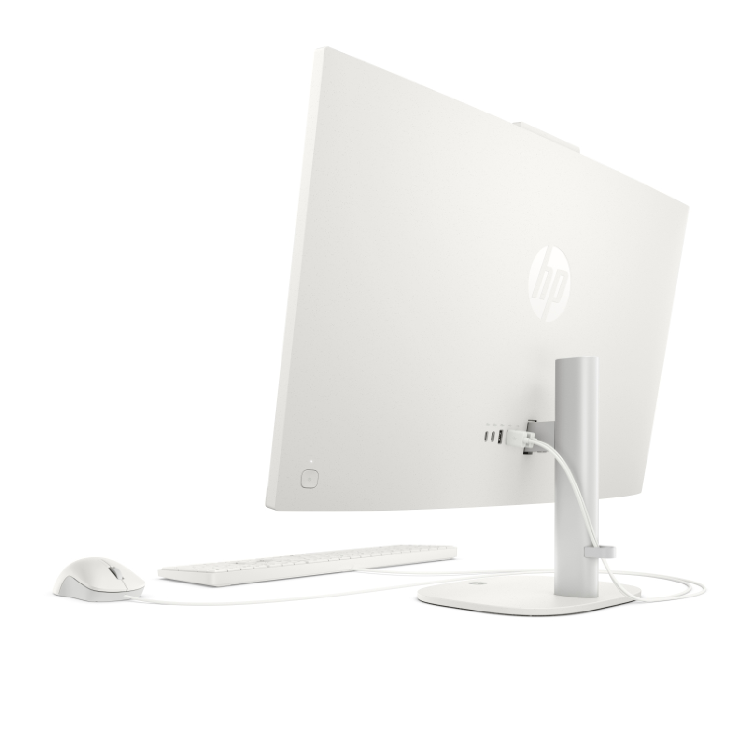 Vista trasera de un ordenador de sobremesa HP todo en uno blanco con teclado y ratón.