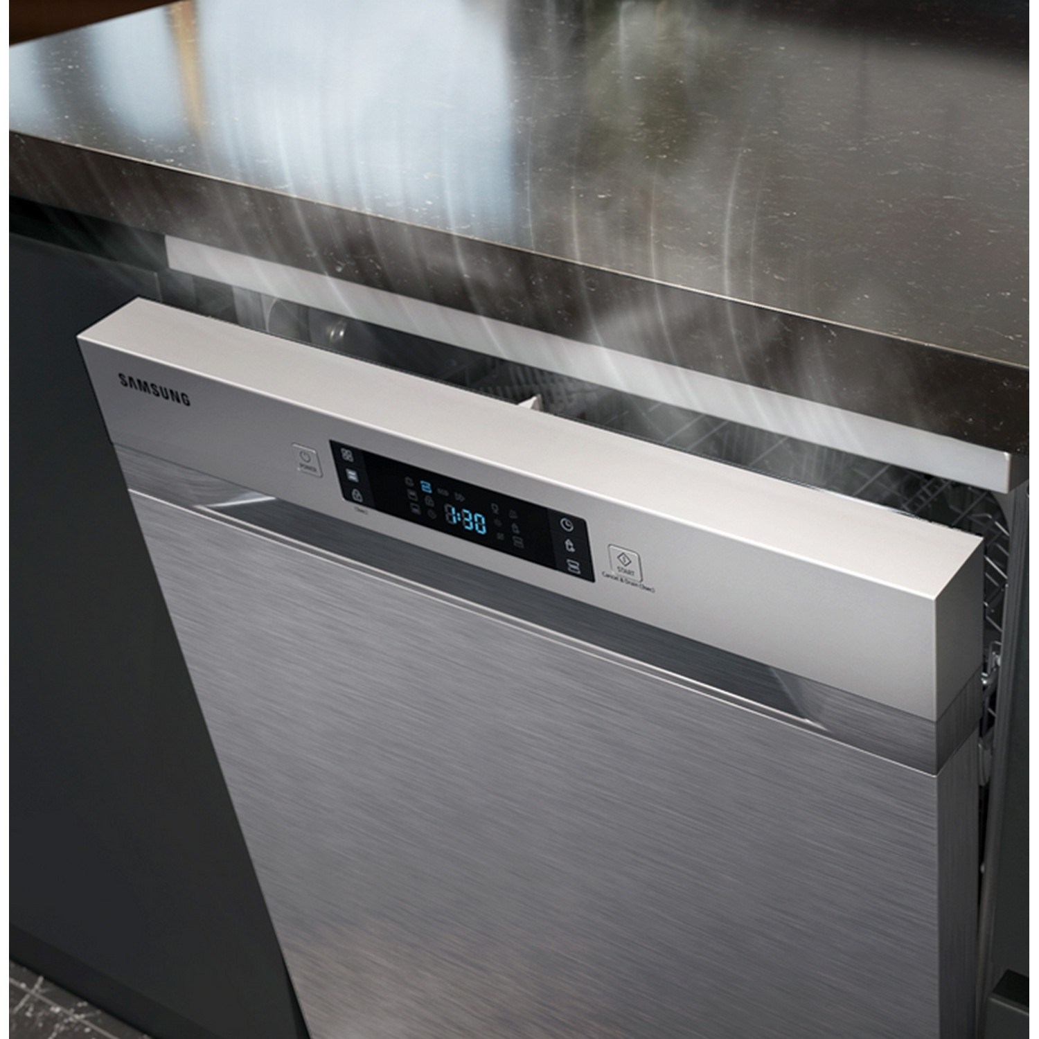 A silver Samsung dishwasher is open slightly, with warm steam rising from the top under a dark countertop.