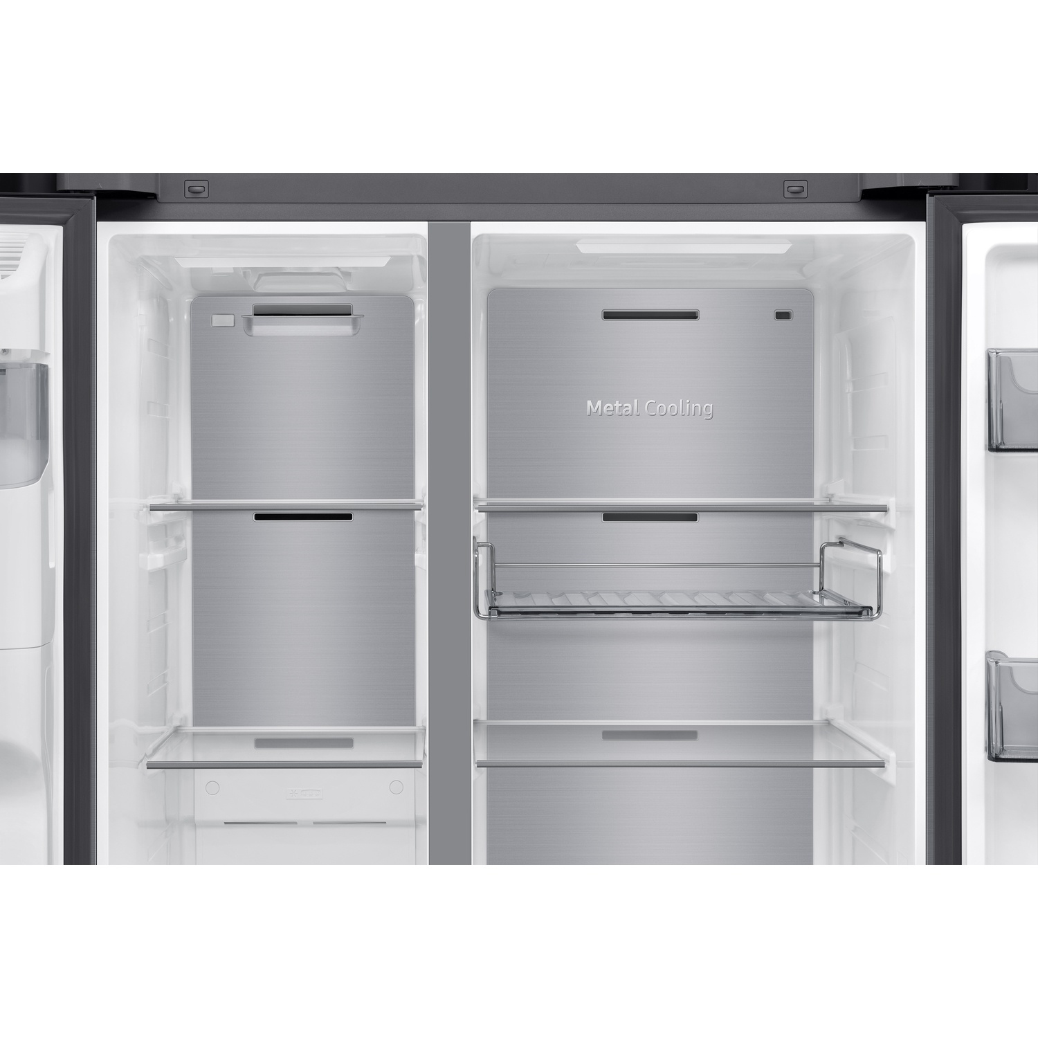 Open refrigerator interior with metal cooling back panel, glass shelves, and illuminated compartments.