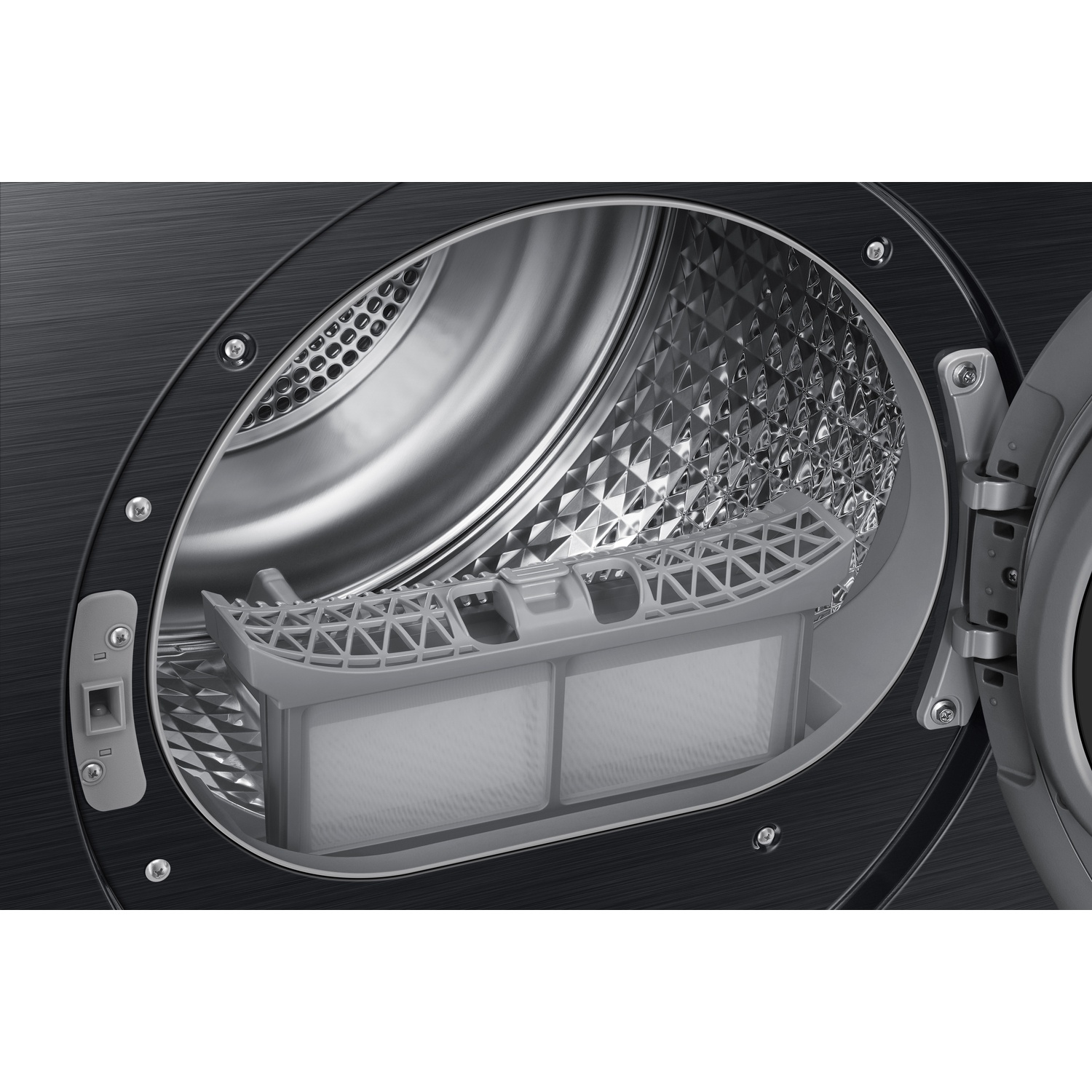 Open drum of a modern clothes dryer with a grey lint filter in the foreground and shiny interior surface.