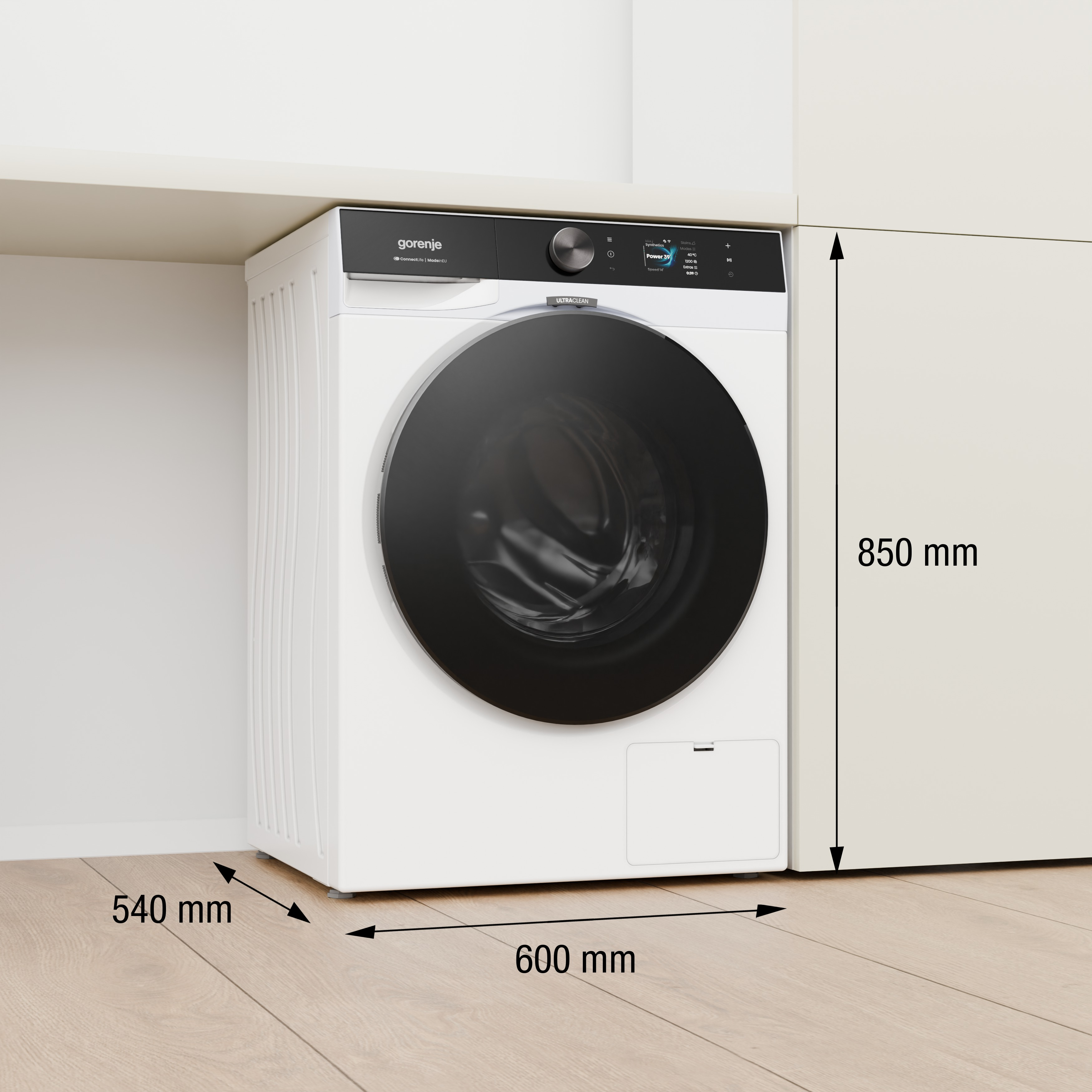 Weiße Gorenje-Waschmaschine unter einer Theke, mit Abmessungen von 850x600x540 mm.