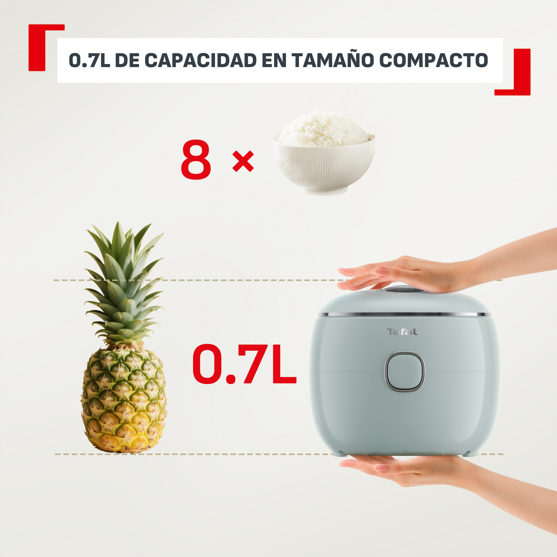 Arrocera compacta Tefal de 0.7L, mostrada junto a una piña para comparar tamaño.