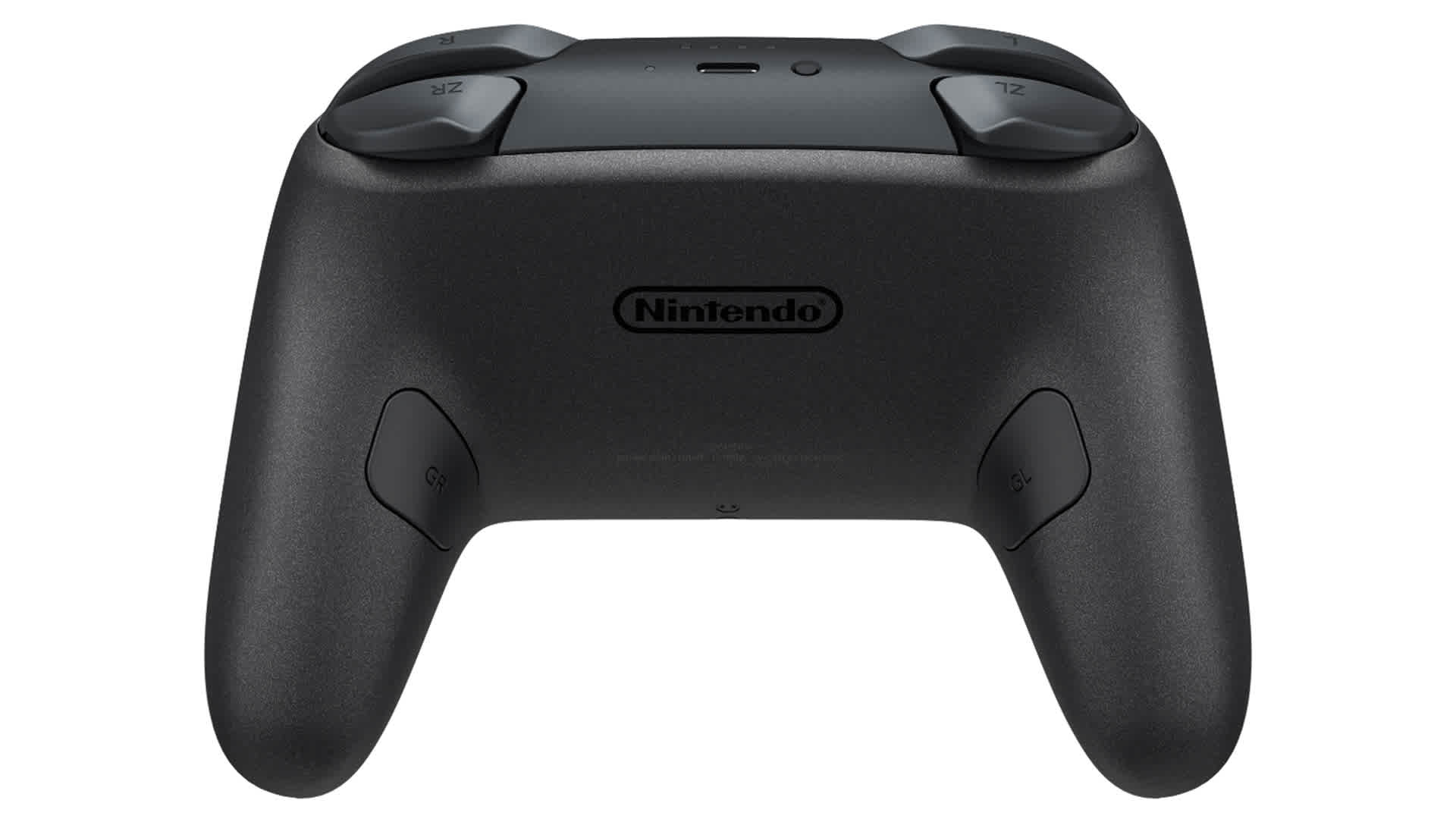 Widok z tyłu czarnego kontrolera Nintendo z przyciskami na górze i logo Nintendo pośrodku.
