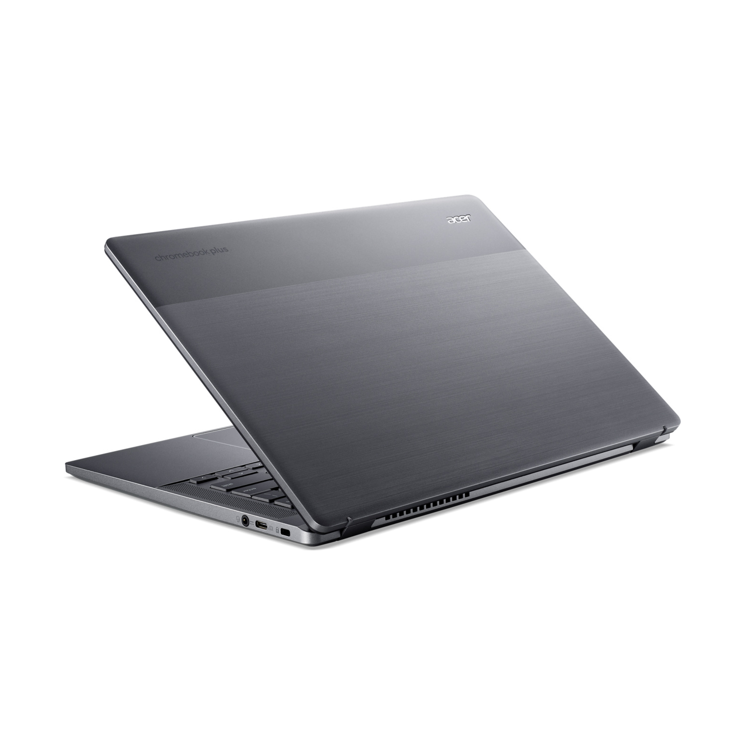 Un computer portatile grigio chiuso Acer Chromebook Plus su superficie bianca.