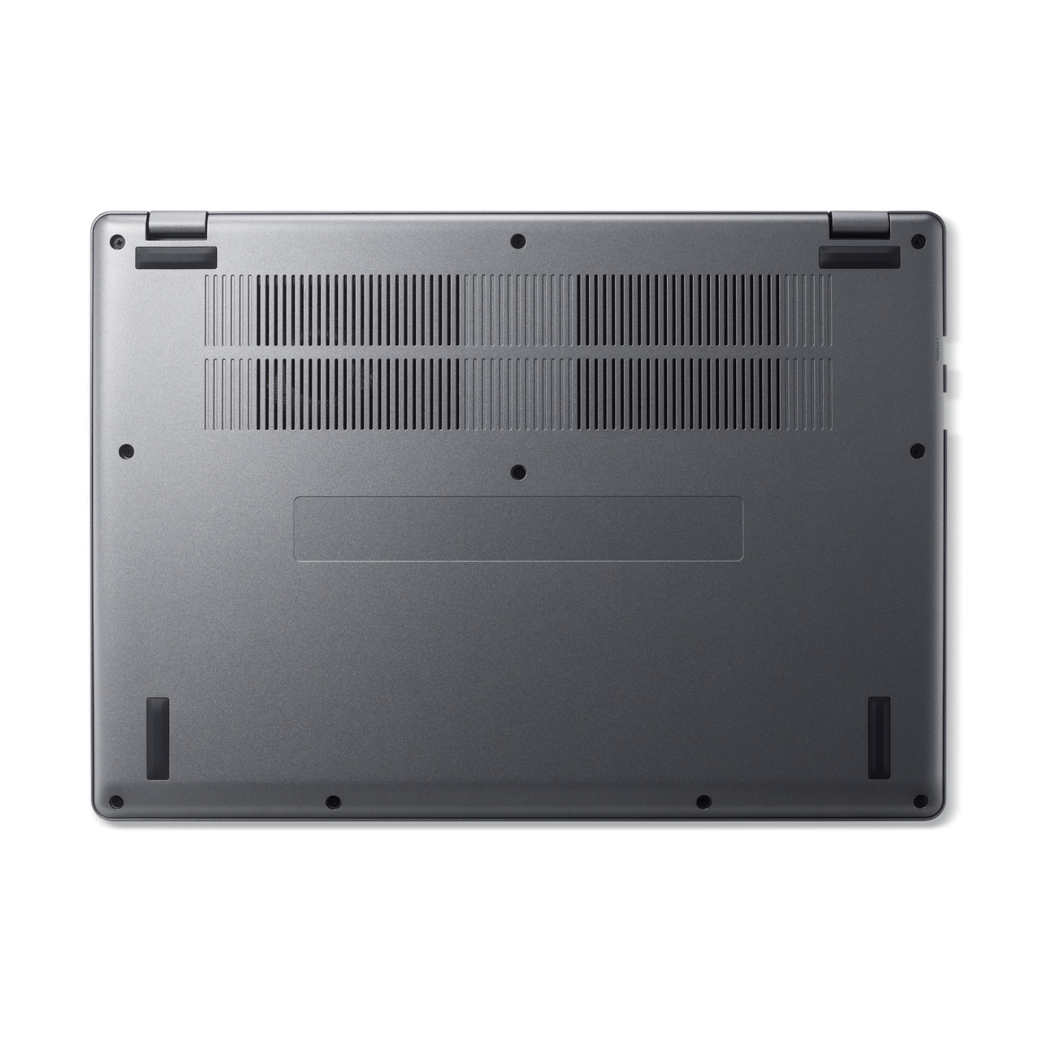 La vista inferiore di un laptop grigio con feritoie di ventilazione e piedini.