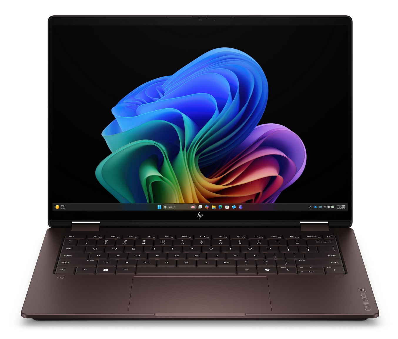 Brązowy laptop z kolorową tapetą i klawiaturą na czarnym tle.