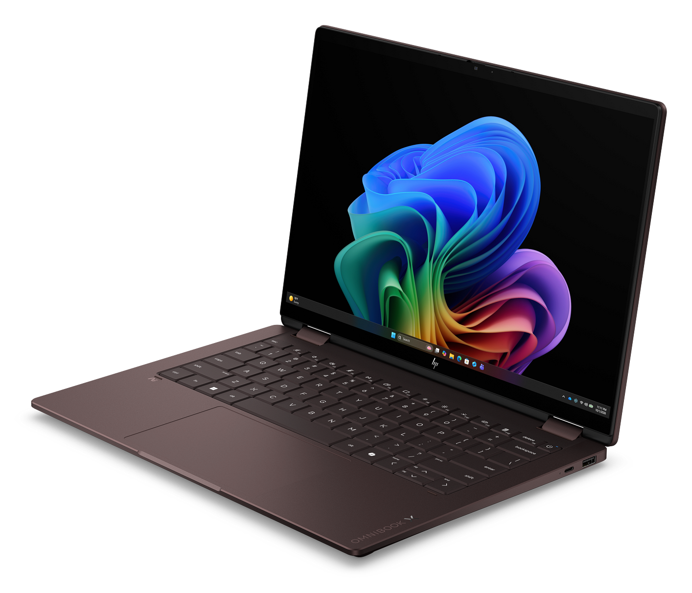 Laptop w kolorze różowego złota z kolorową, abstrakcyjną grafiką kwiatową na ekranie i ciemnym tłem.