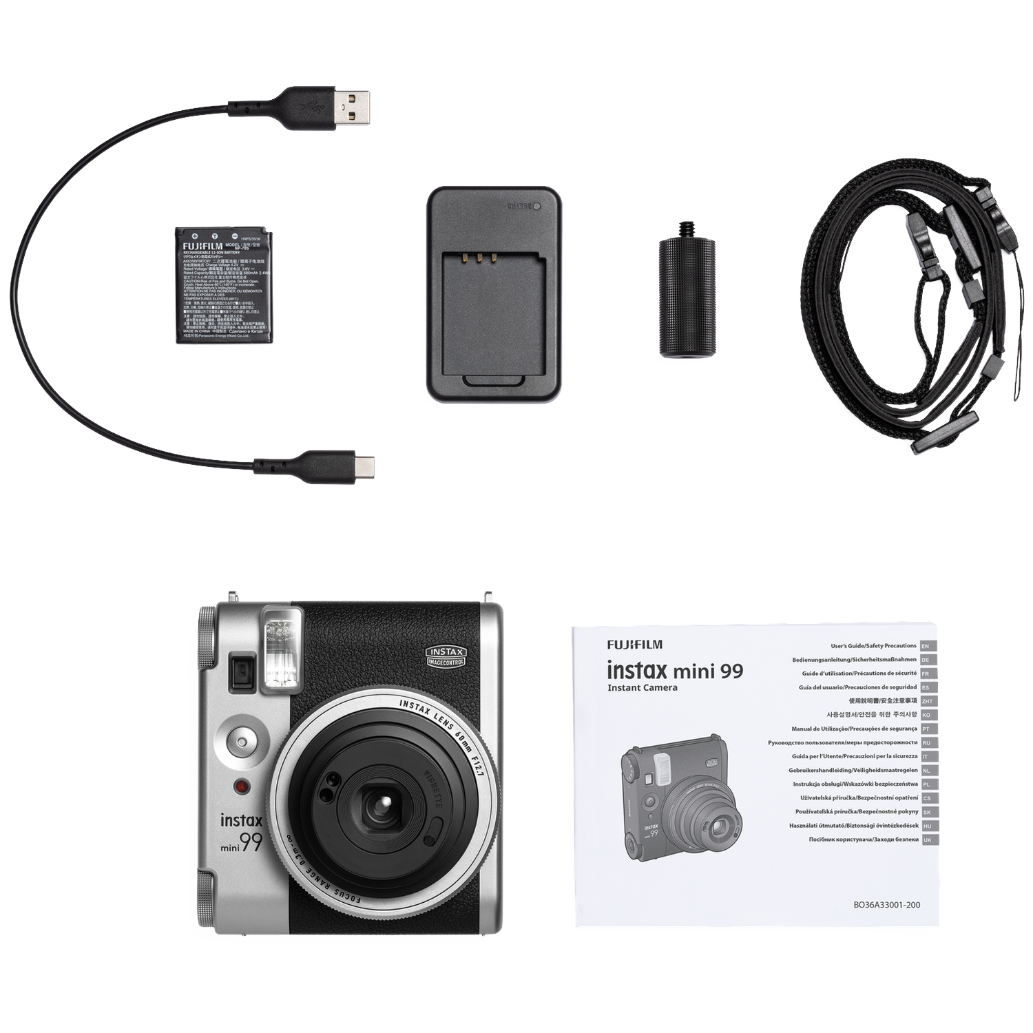 Een zilveren Fujifilm Instax Mini 99 camera, accu, oplader, kabel, schouderriem, grip en handleiding.