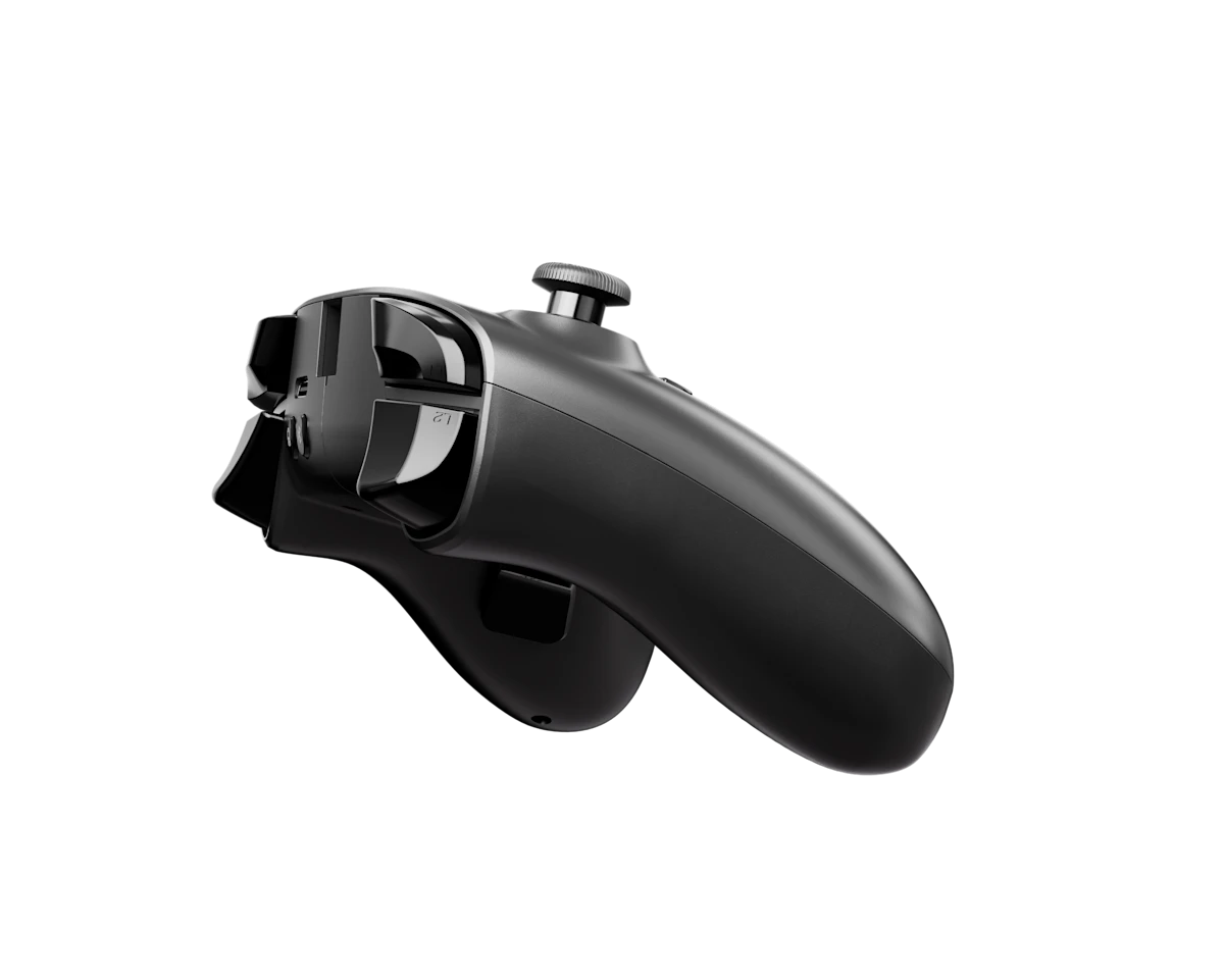 Egy fekete játékvezérlő vállgombokkal és analóg karral fekete háttér előtt.