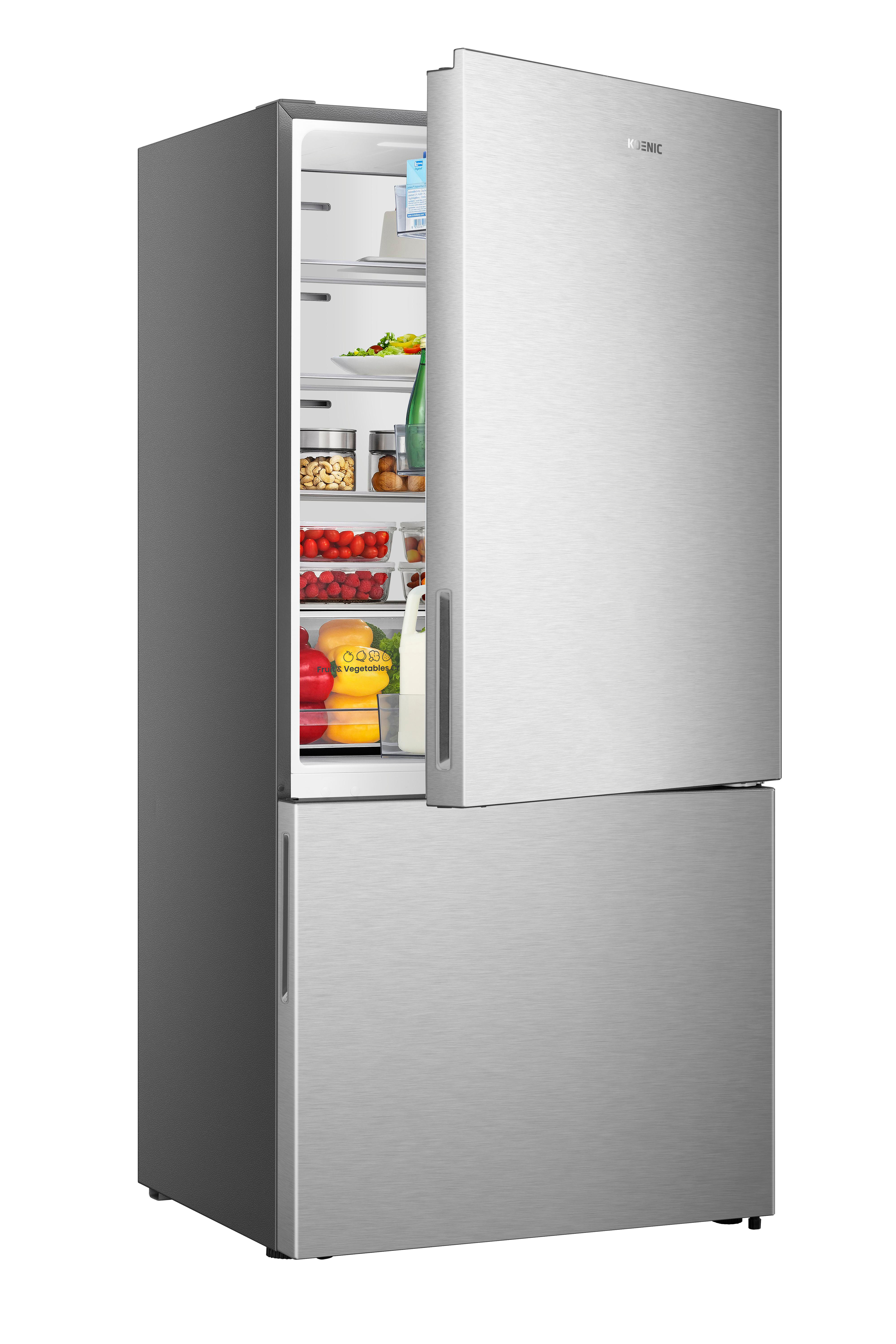 Silberner Koenic-Kühlschrank mit geöffneter Tür, gefüllt mit frischem Obst, Gemüse und Lebensmitteln.