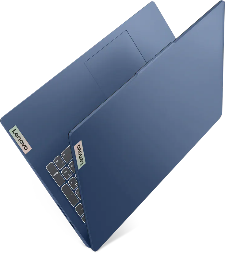 Egy kék Lenovo laptop zárt fedéllel és látható billentyűzettel, fekete háttér előtt.