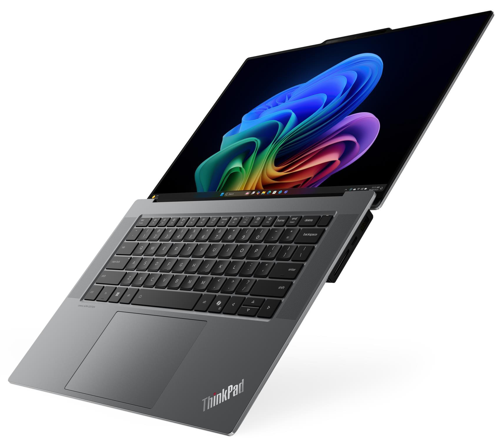 Egy szürke ThinkPad laptop nyitott képernyővel, színes, absztrakt Windows háttérképpel.