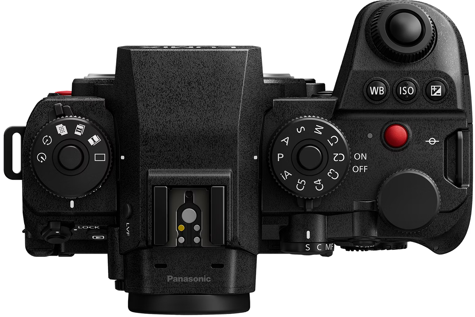 Vue de dessus d'un appareil photo Panasonic noir avec des molettes, des boutons et un bouton d'enregistrement rouge sur fond noir.