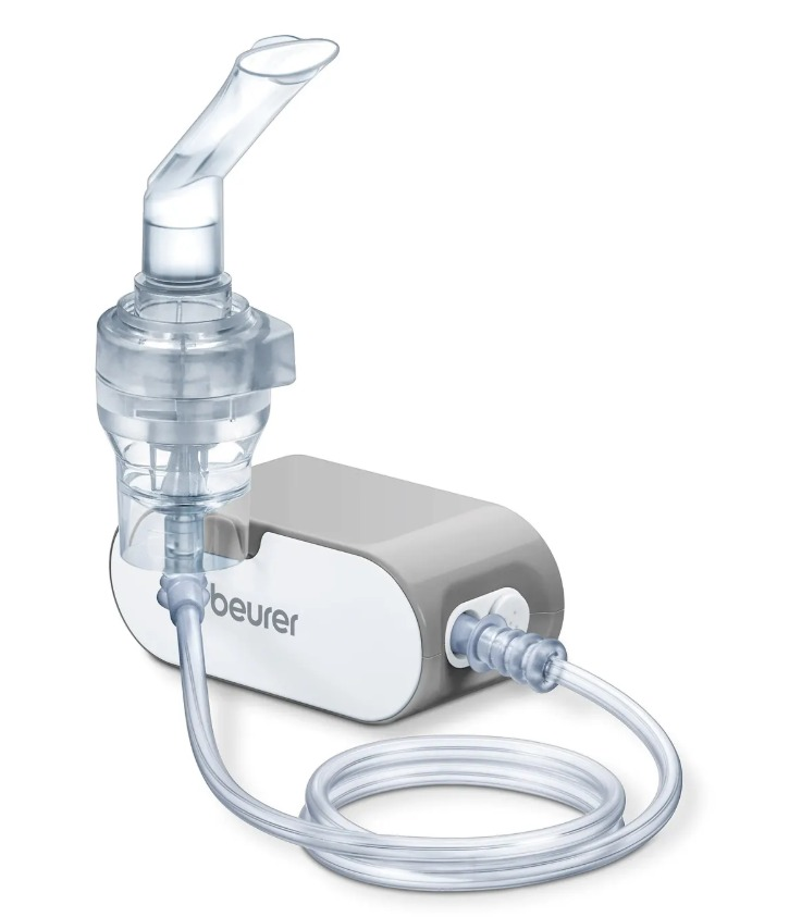 Biało-szary nebulizator z podłączoną przezroczystą rurką z tworzywa sztucznego i ustnikiem.