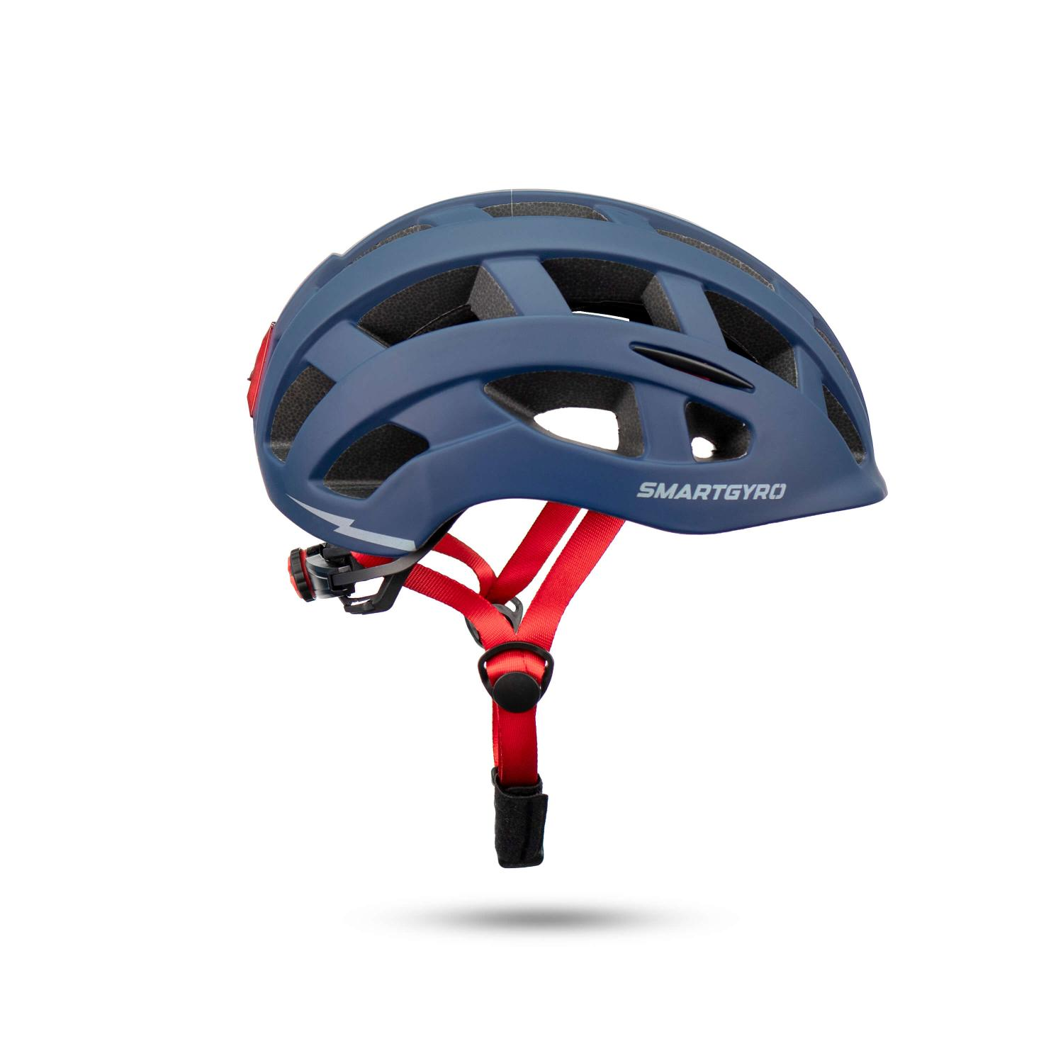 Un casco de bicicleta Smartgyro azul con correas rojas sobre fondo blanco.