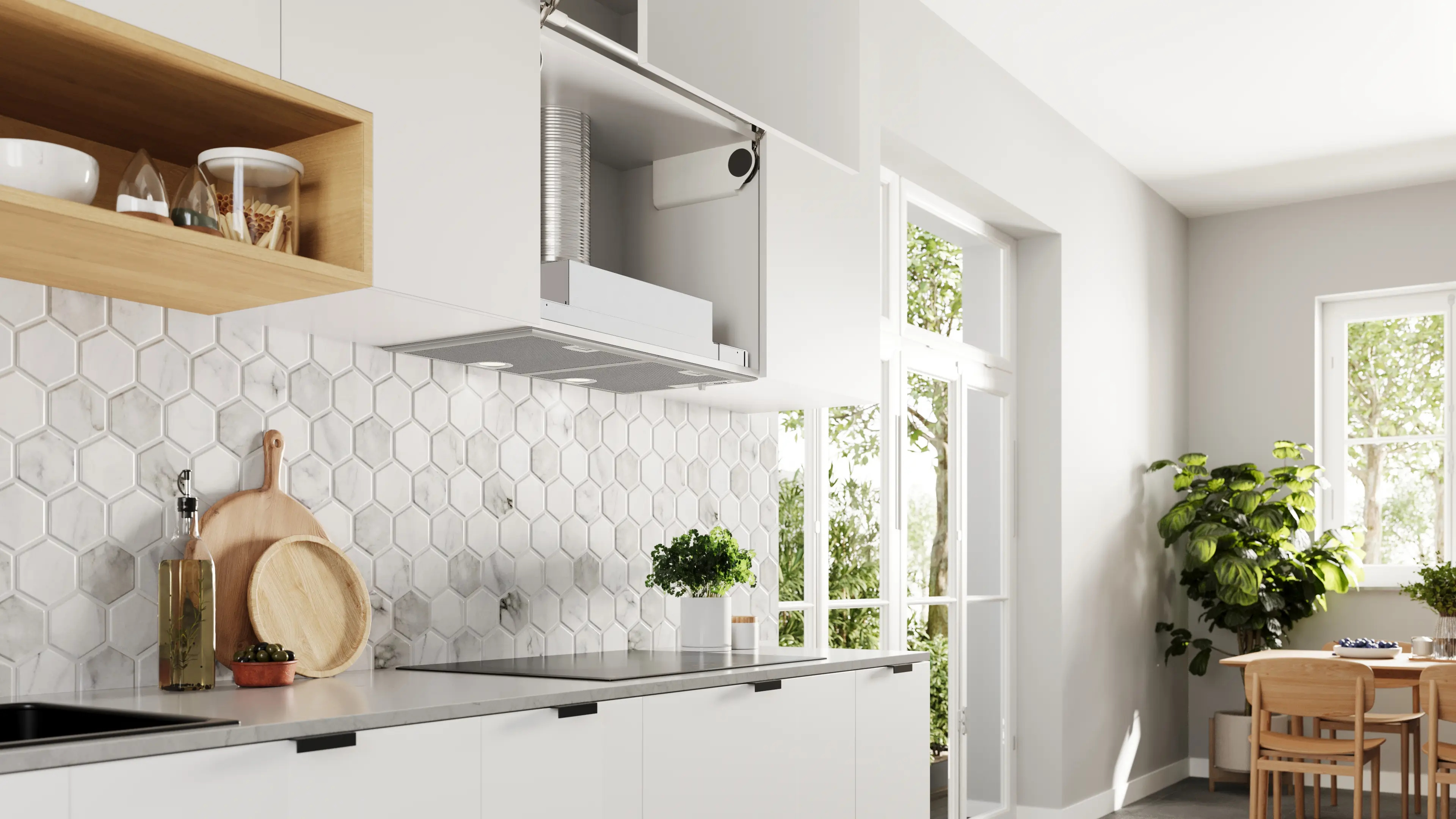 Cocina blanca moderna con azulejos de mármol, detalles de madera, estufa integrada y vistas al jardín.