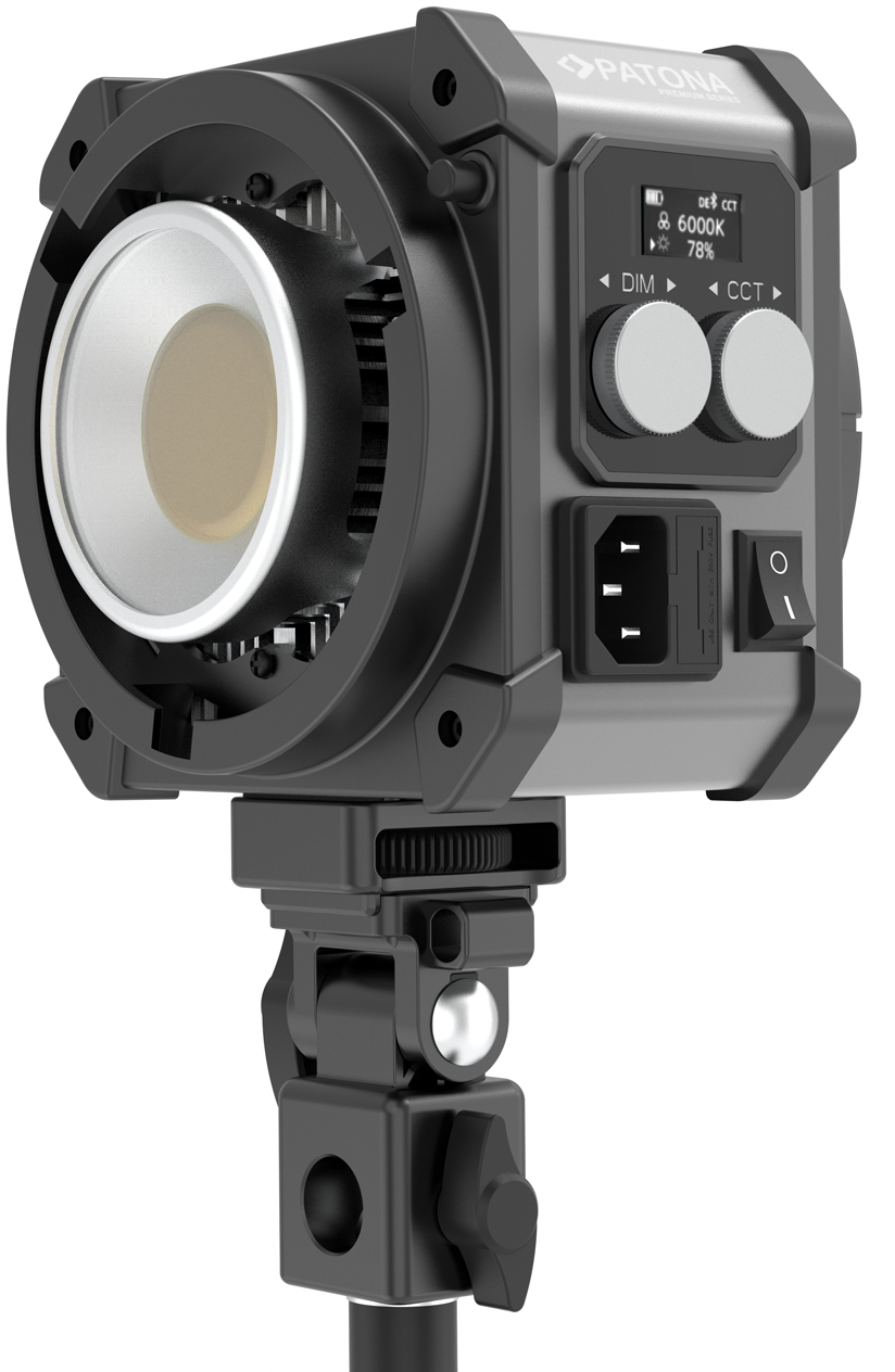 Une lampe de studio LED Patona grise et noire sur pied, dotée d'un écran et de deux boutons de réglage.