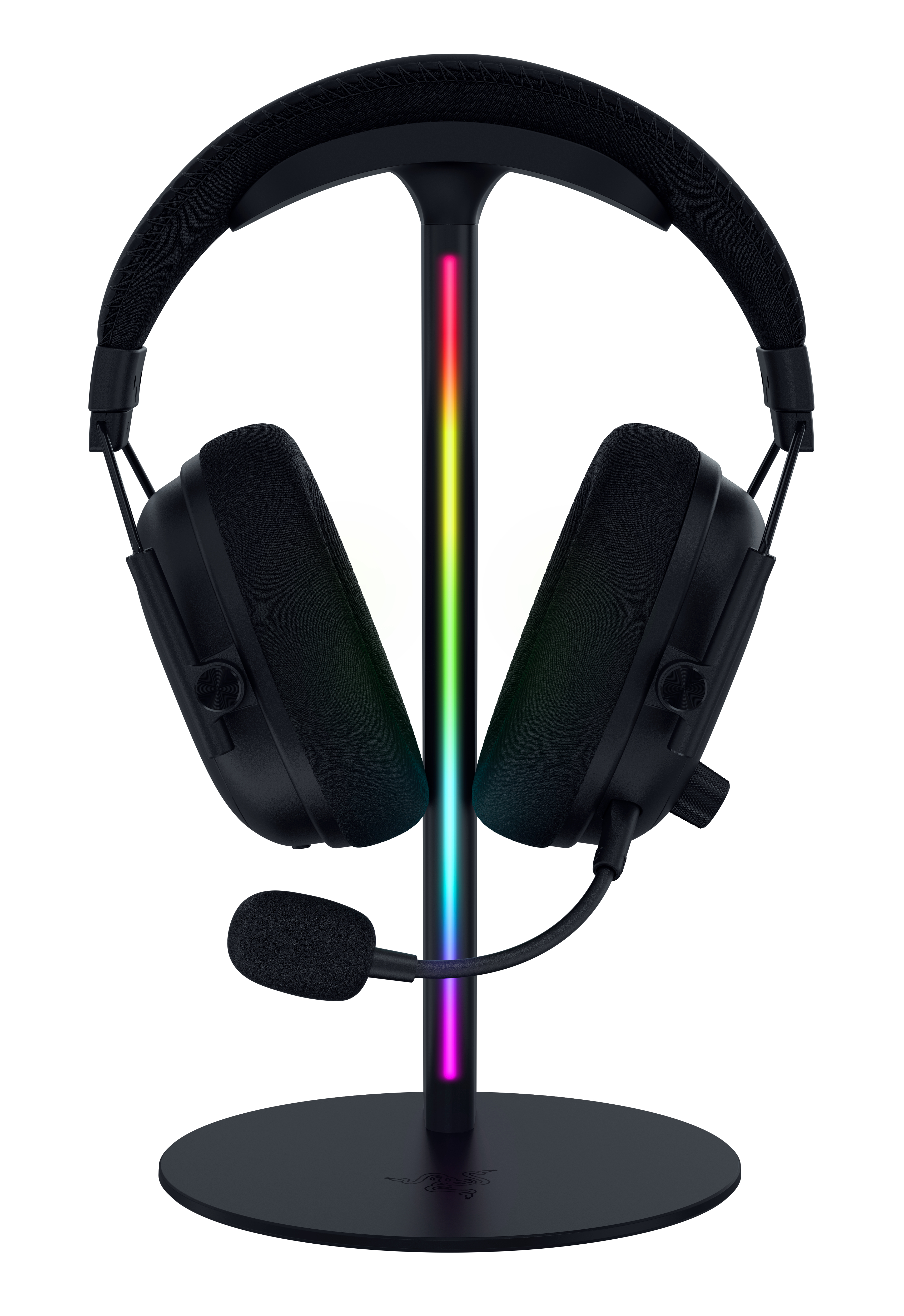 Schwarzes Gaming-Headset auf einem RGB-beleuchteten Ständer vor weißem Hintergrund.