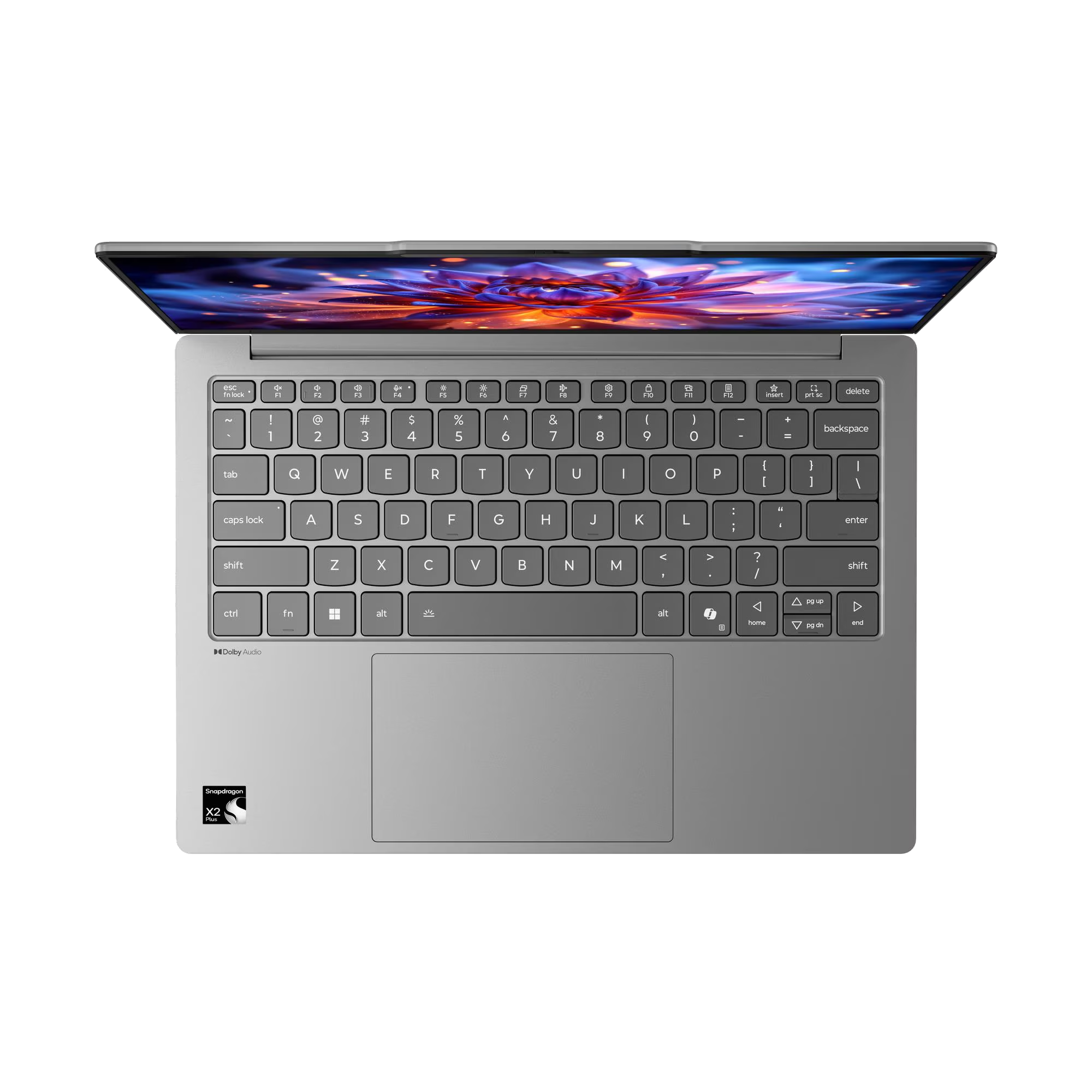 Vista superior de un portátil gris con pantalla iluminada, teclado y panel táctil.