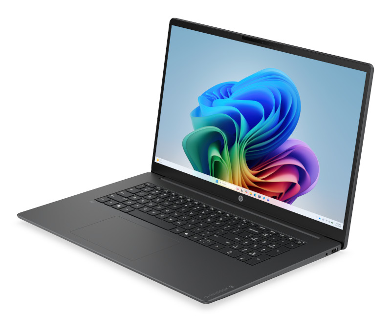 Szary laptop HP OmniBook z kolorowym wzorem fal na ekranie na białym tle.