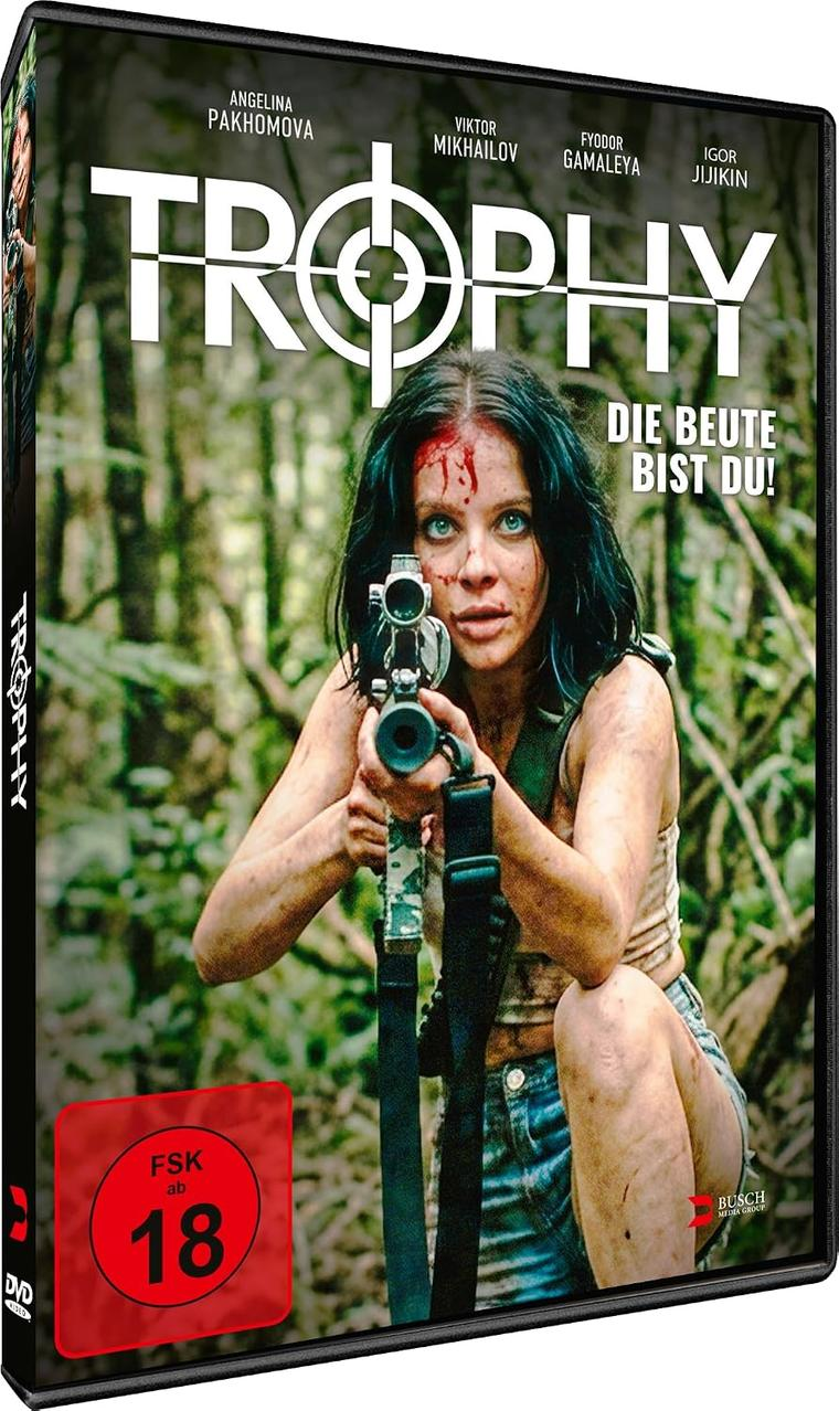 DVD-Cover von Trophy: Eine blutverschmierte Frau zielt mit einem Gewehr im Wald.