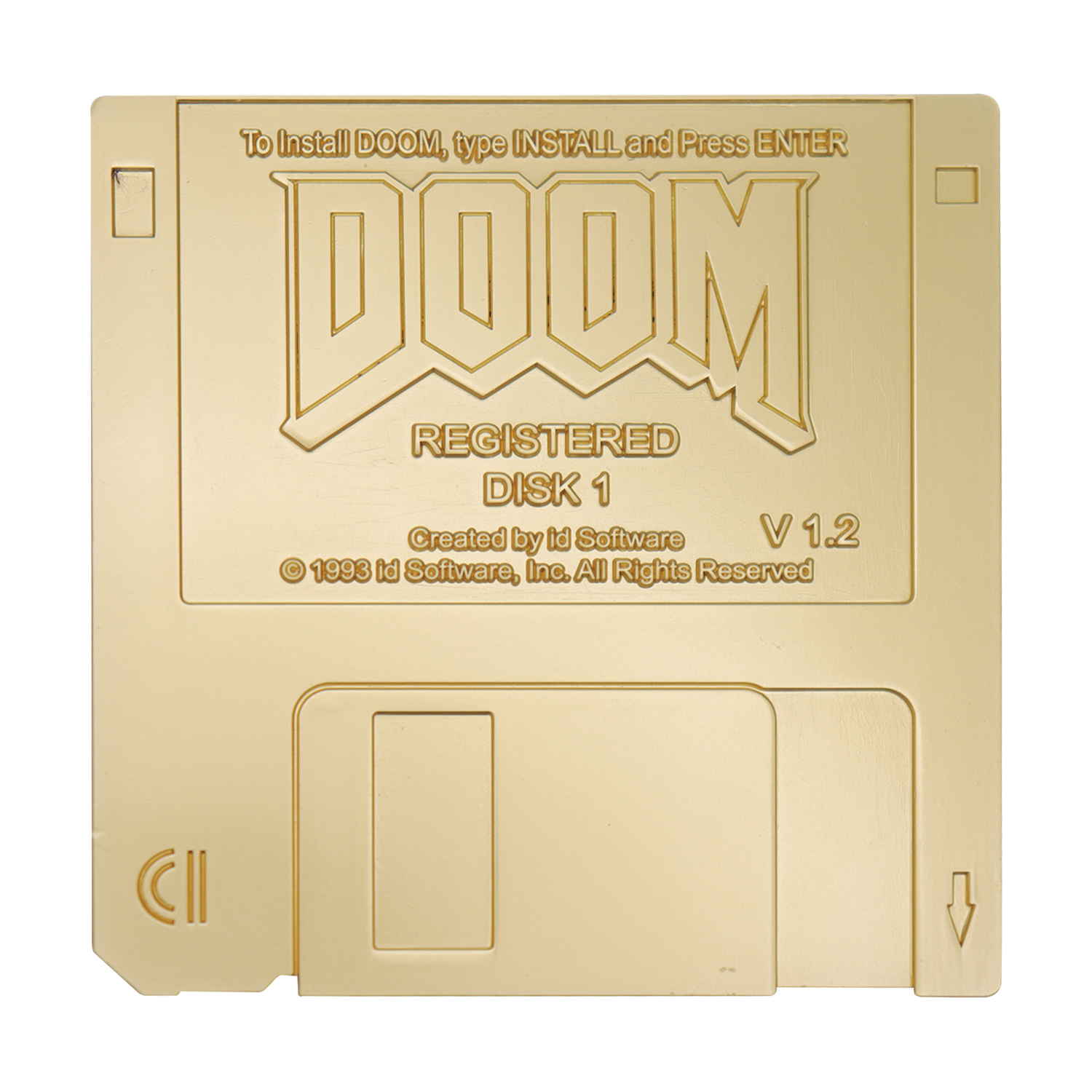 Un disquete dorado de 3.5 pulgadas con relieve de DOOM, versión 1.2, sobre fondo negro.