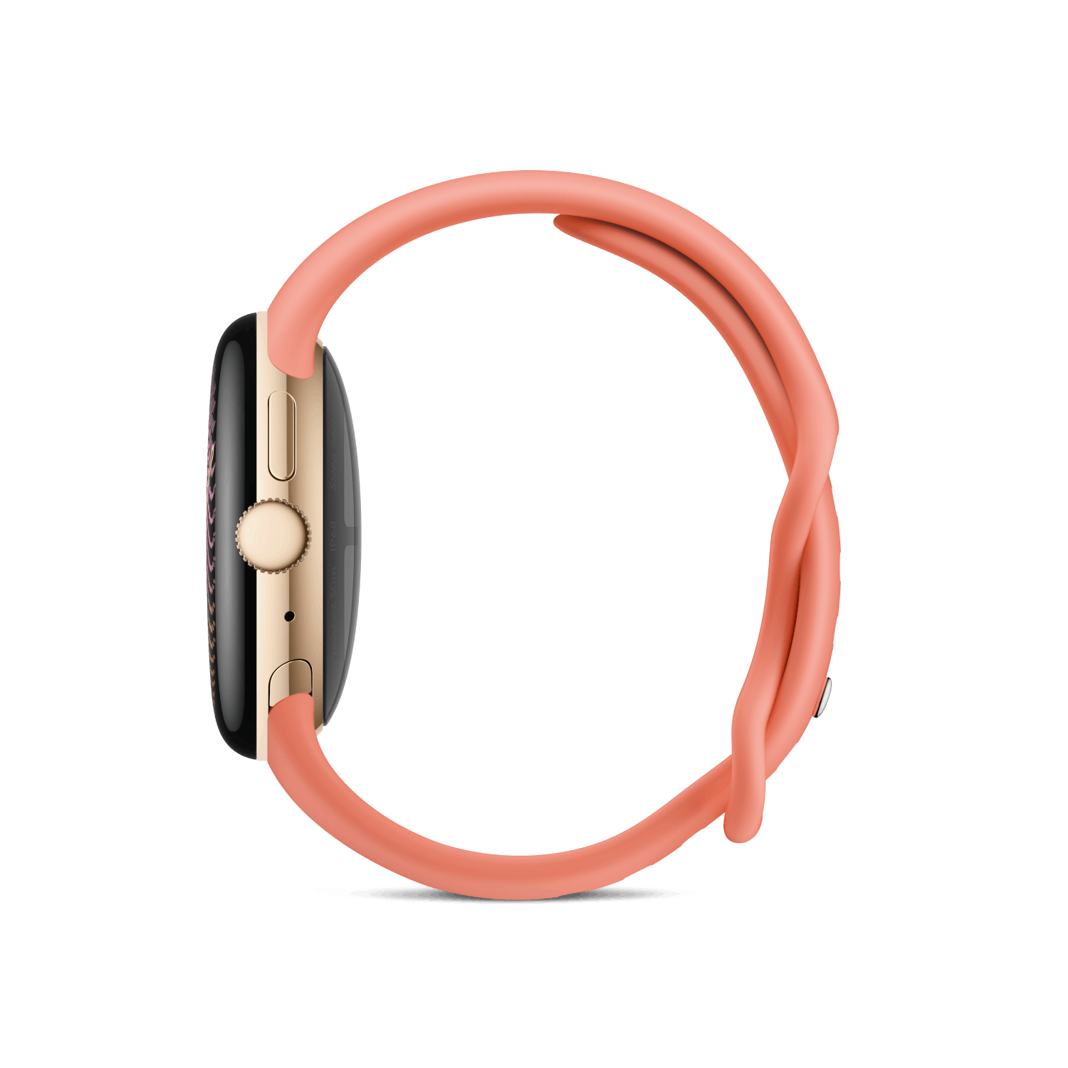 Un reloj inteligente con caja dorada y correa de silicona color coral sobre fondo negro.