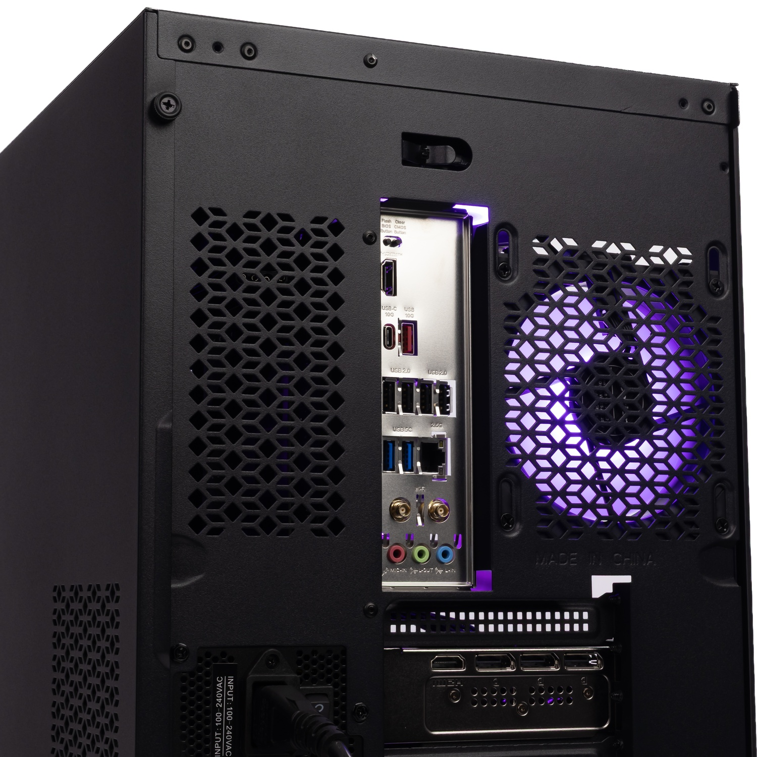 Back of a black PC case showing I/O ports, a fan with purple lighting, and a power supply.