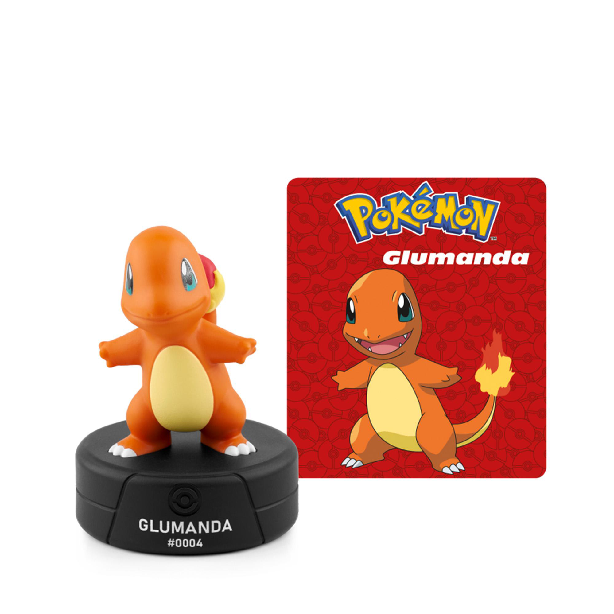 Eine Glumanda-Figur auf einem runden schwarzen Sockel neben einer roten Pokemon-Karte mit Bild.