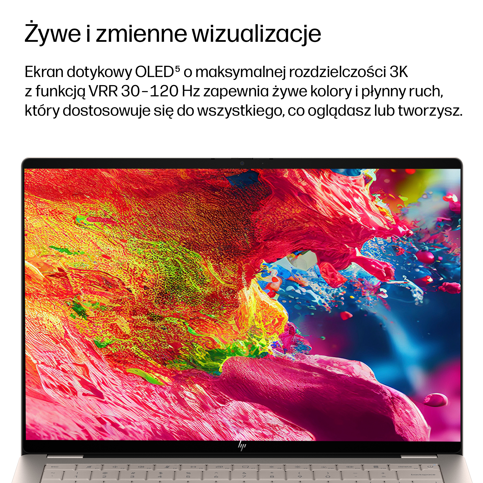 Laptop wyświetla na ekranie żywą, kolorową, abstrakcyjną plamę farby.