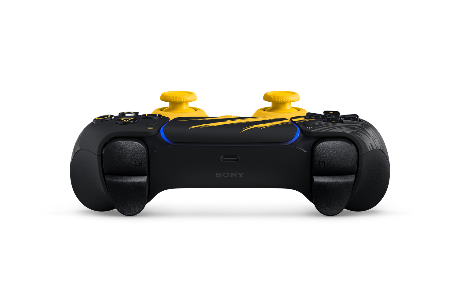 Controlador negro de PlayStation con joysticks amarillos y gráficos sobre fondo negro.