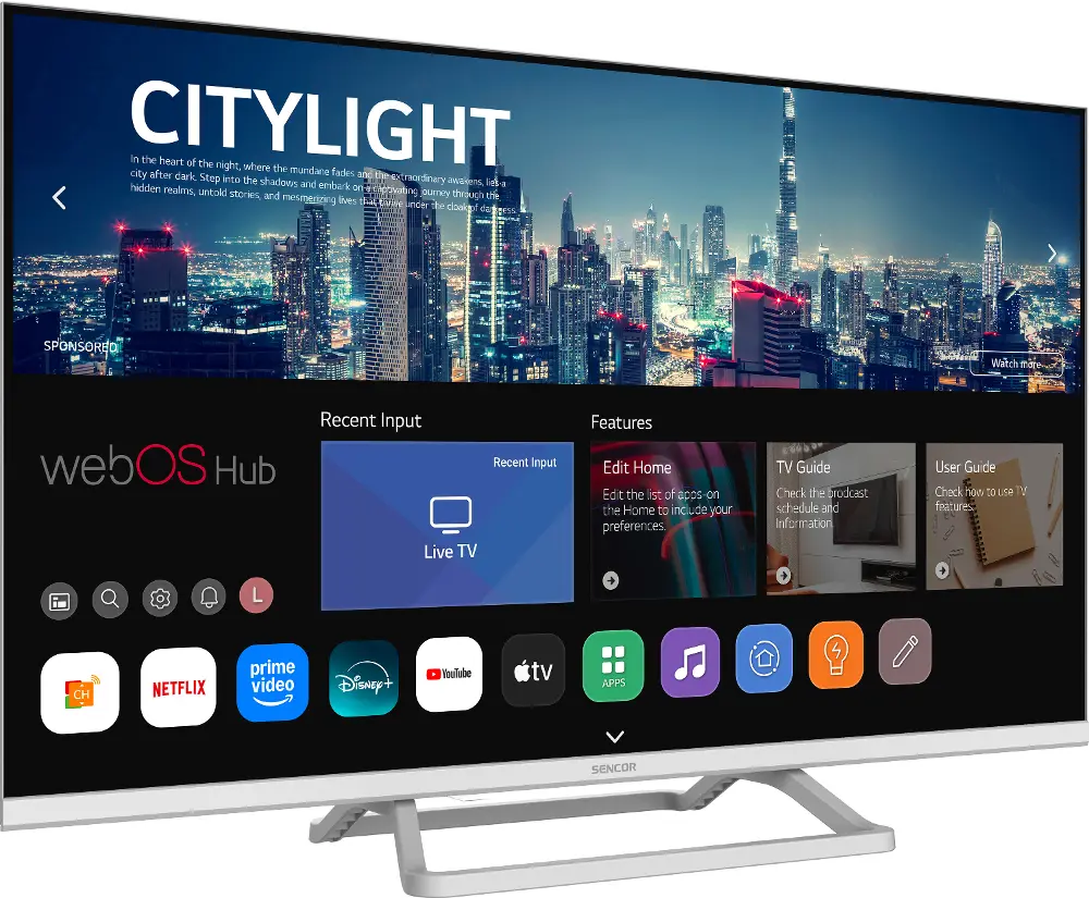 Egy Sencor TV mutatja a webOS Hub menüt alkalmazásokkal egy éjszakai városi táj felett.