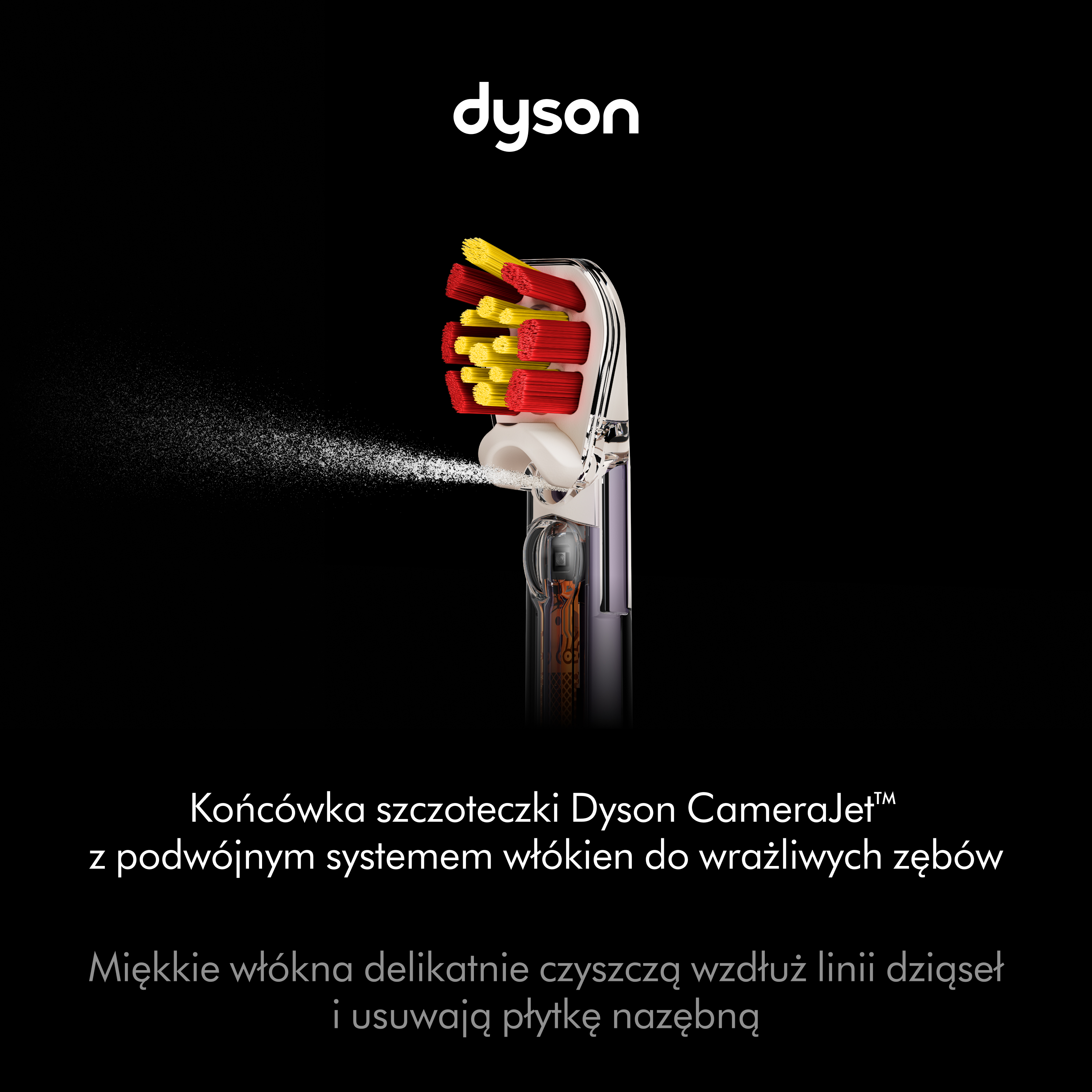 Główka szczoteczki Dyson z czerwonymi i żółtymi wlóknami rozpylająca wodę na czarnym tle.