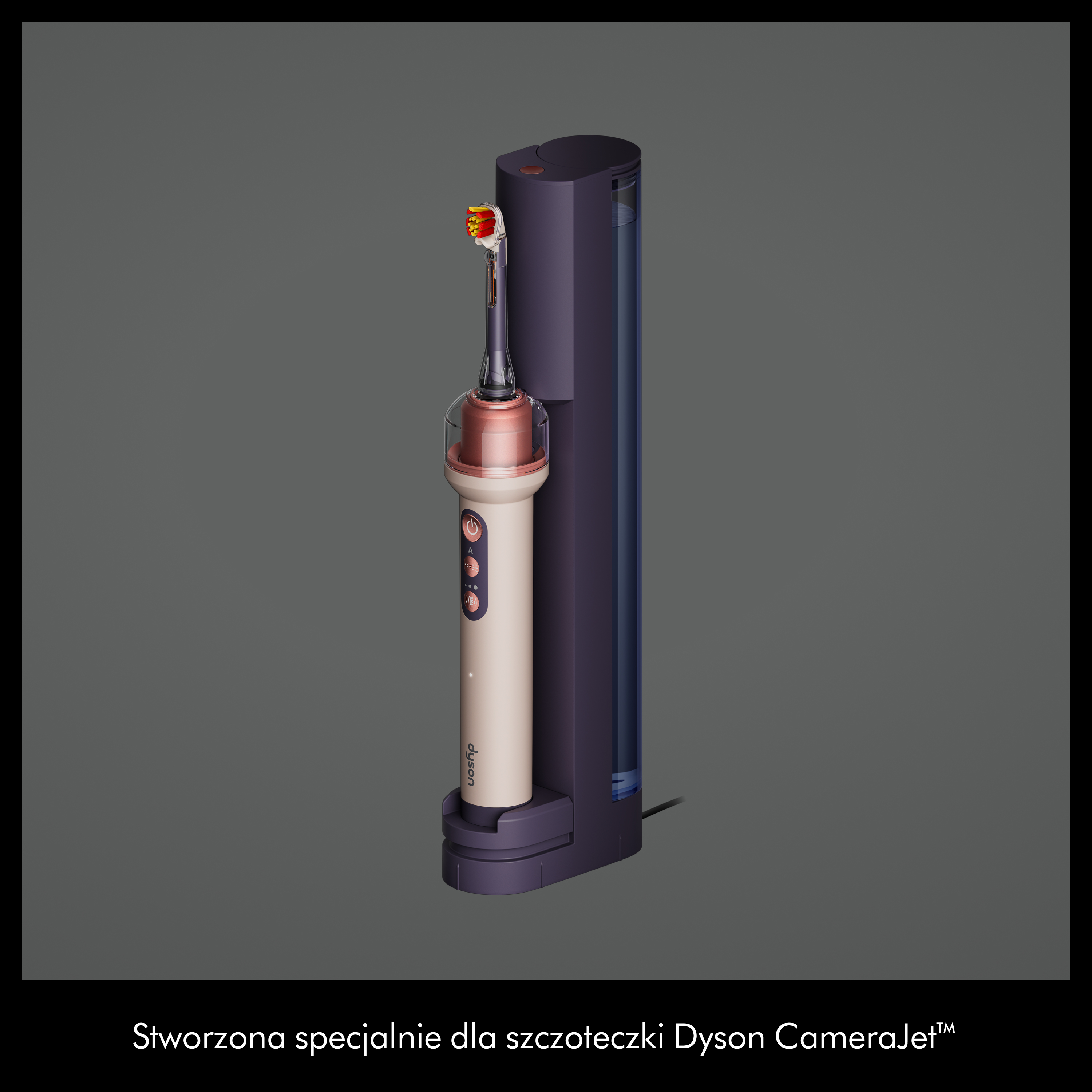 Fioletowa szczoteczka do zębów Dyson CameraJet w stacji ładującej na szarym tle.