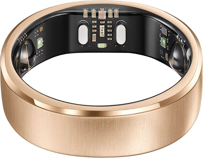 Un anello intelligente in oro rosa con sensori ed elettronica all'interno nero, su sfondo bianco.