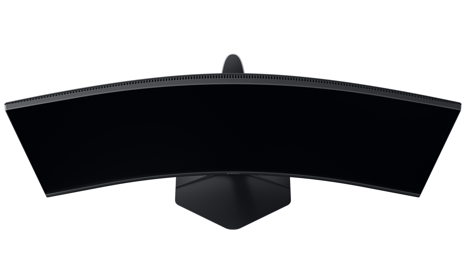 Un monitor de ordenador negro curvado sobre fondo negro, visto desde arriba.