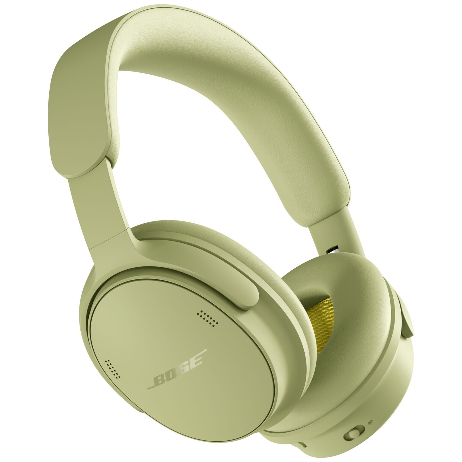Green Bose over-ear headphones on a white background.