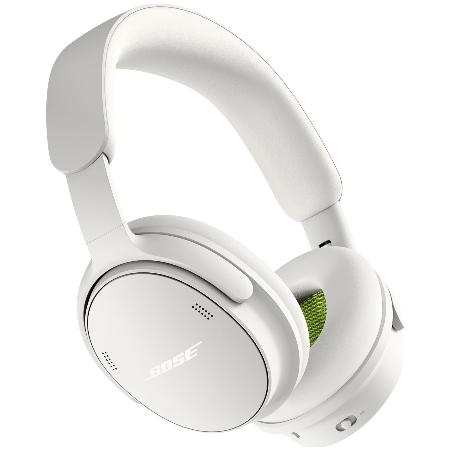 White Bose over-ear headphones with green interior ear pads and Bluetooth symbol.