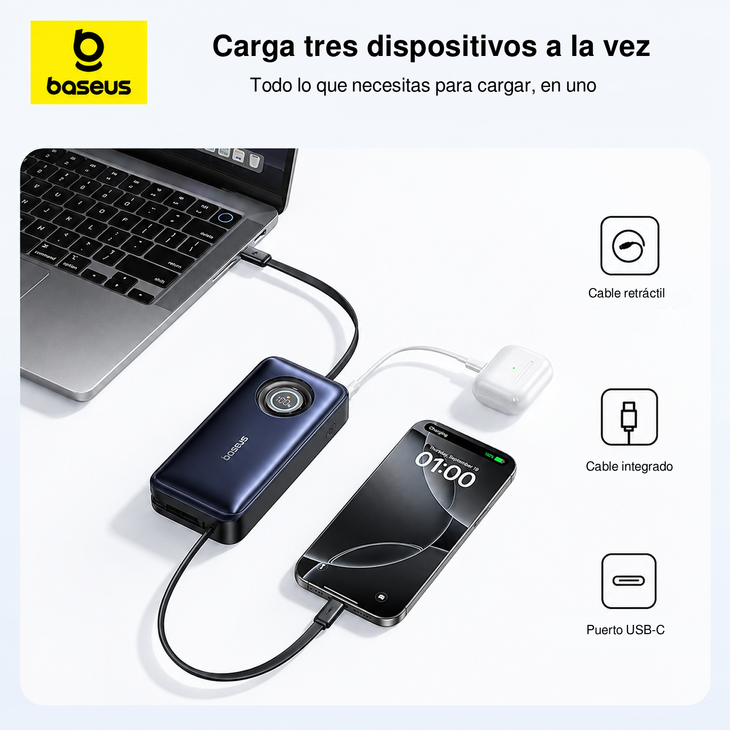 Batería externa Baseus azul cargando una laptop, smartphone y auriculares simultáneamente en una superficie blanca.