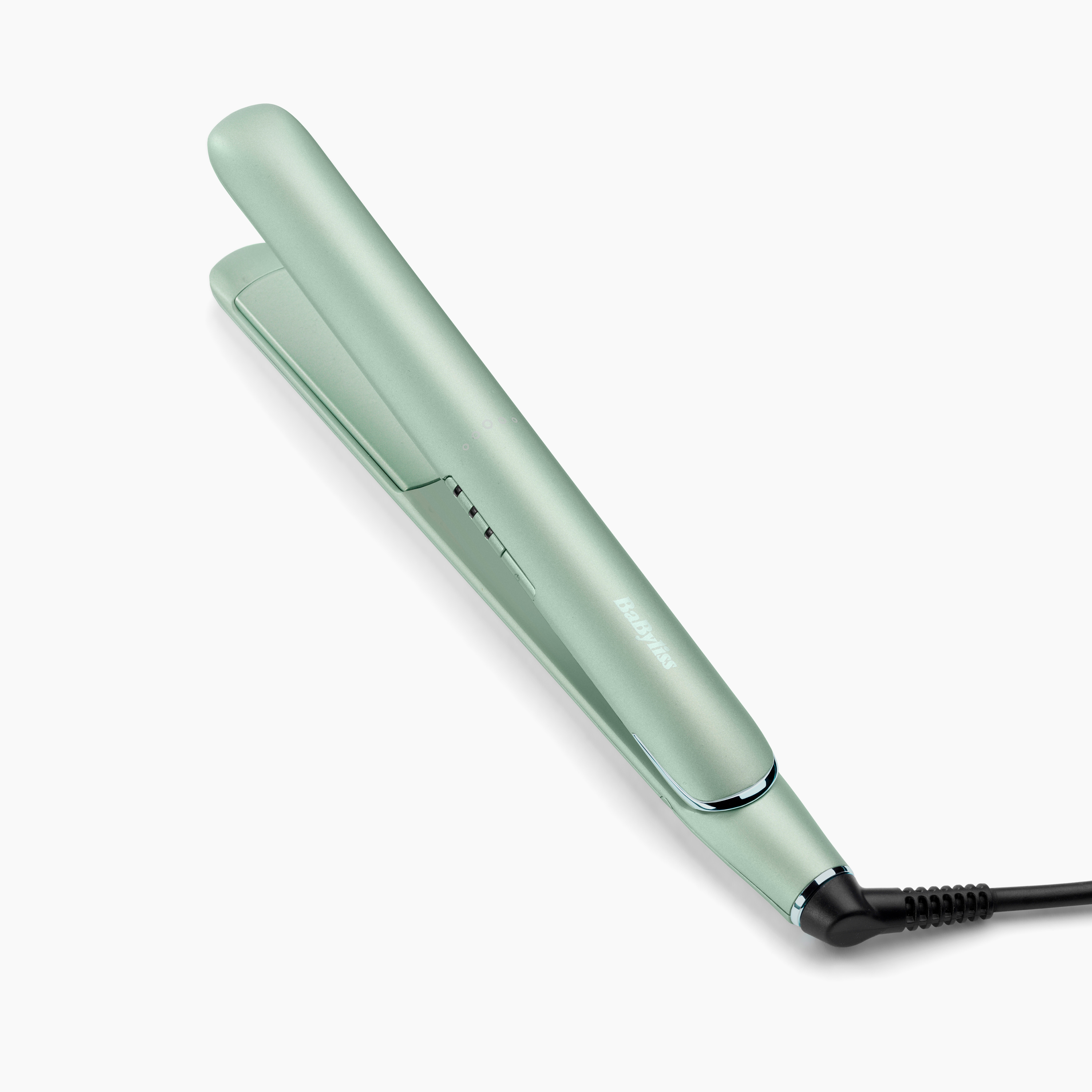 Egy mentazöld Babyliss hajvasaló fekete kábellel, fehér háttér előtt.