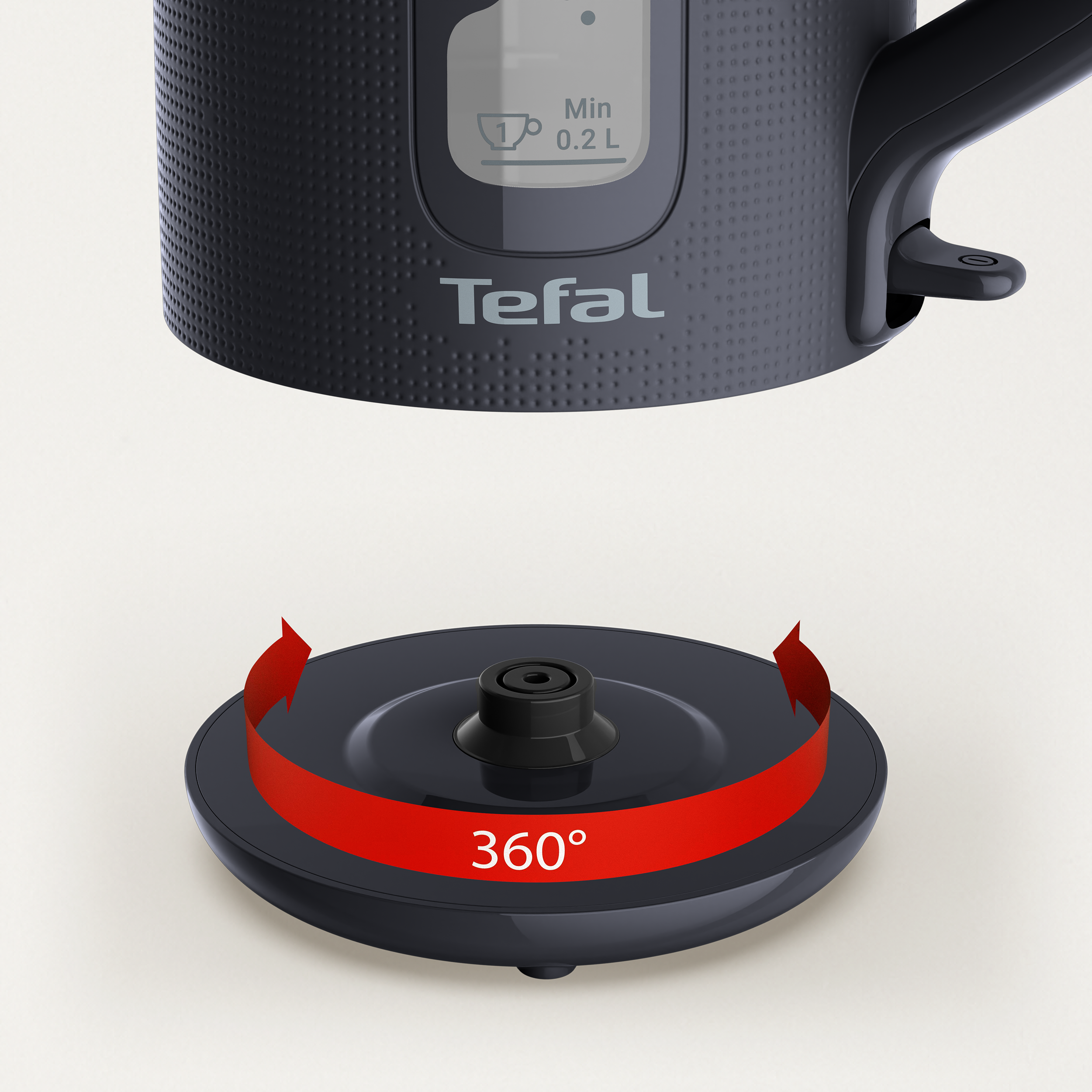 Egy fekete Tefal vízforraló lebeg egy 360 fokban forgó talapzat felett.