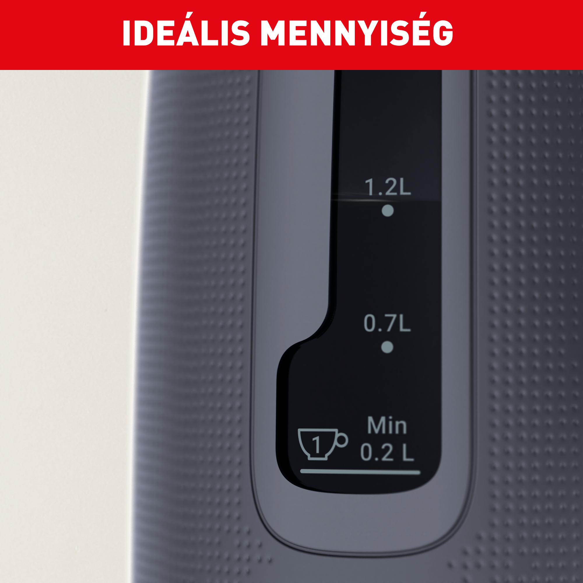Vízszintjelző szürke vízforralón 1,2L, 0,7L és Min 0,2L jelölésekkel, felül piros szöveggel.