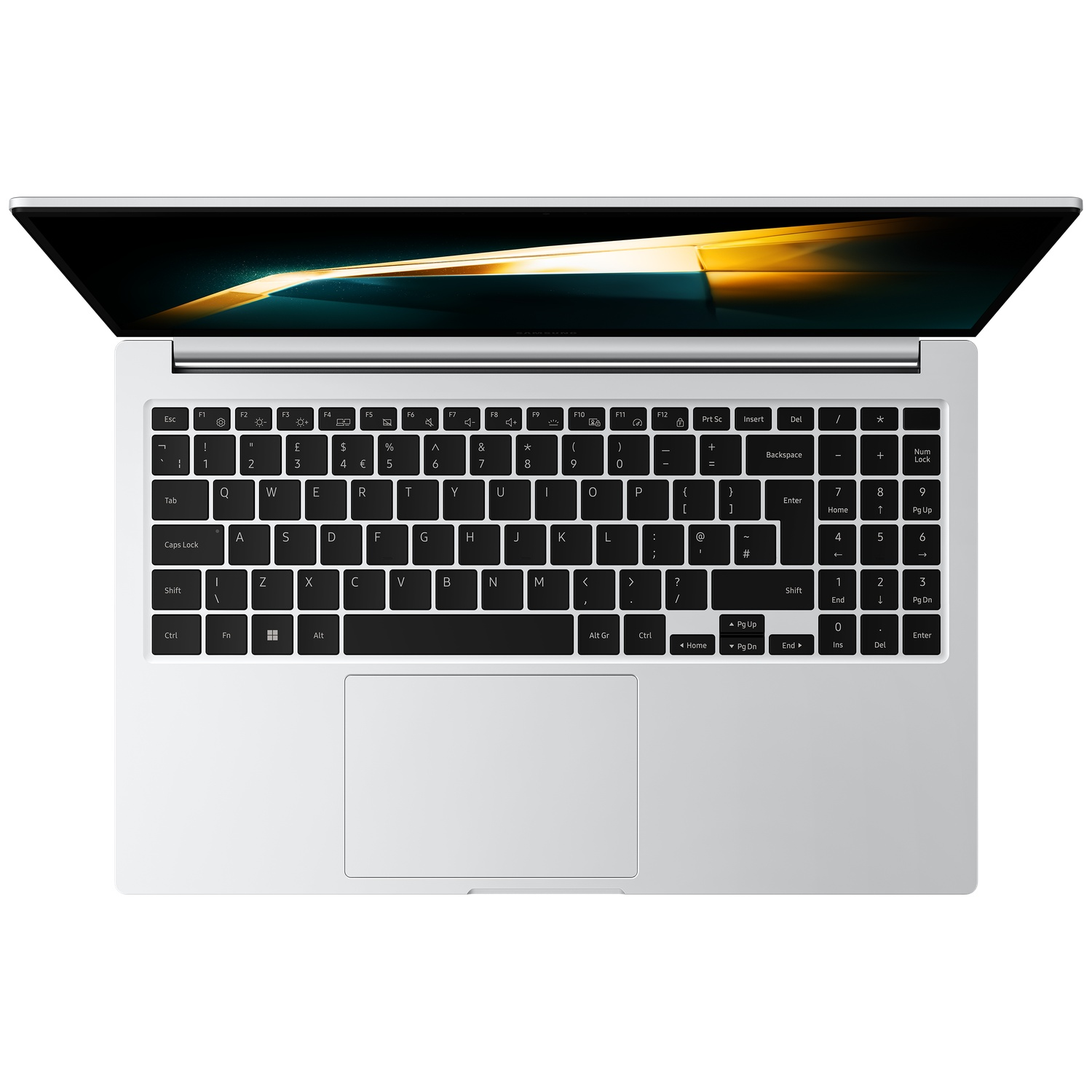 Top-down view of a silver laptop displaying a glowing screen and keyboard.