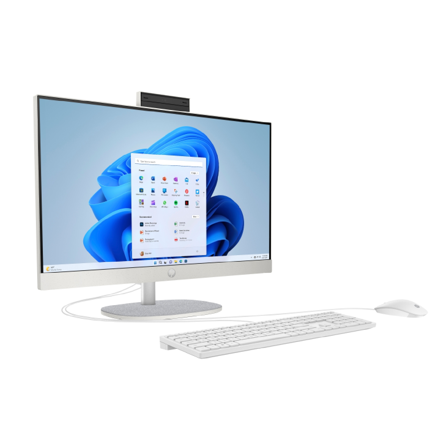 Un ordenador de sobremesa todo en uno blanco con fondo de pantalla azul de Windows, teclado y ratón.