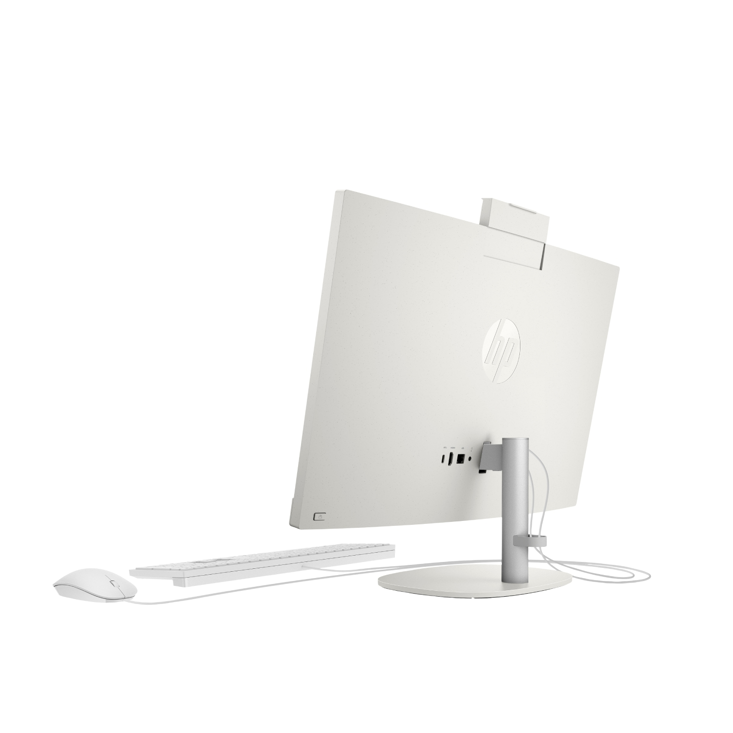Vista trasera de una computadora de escritorio HP todo en uno blanca con teclado y ratón.