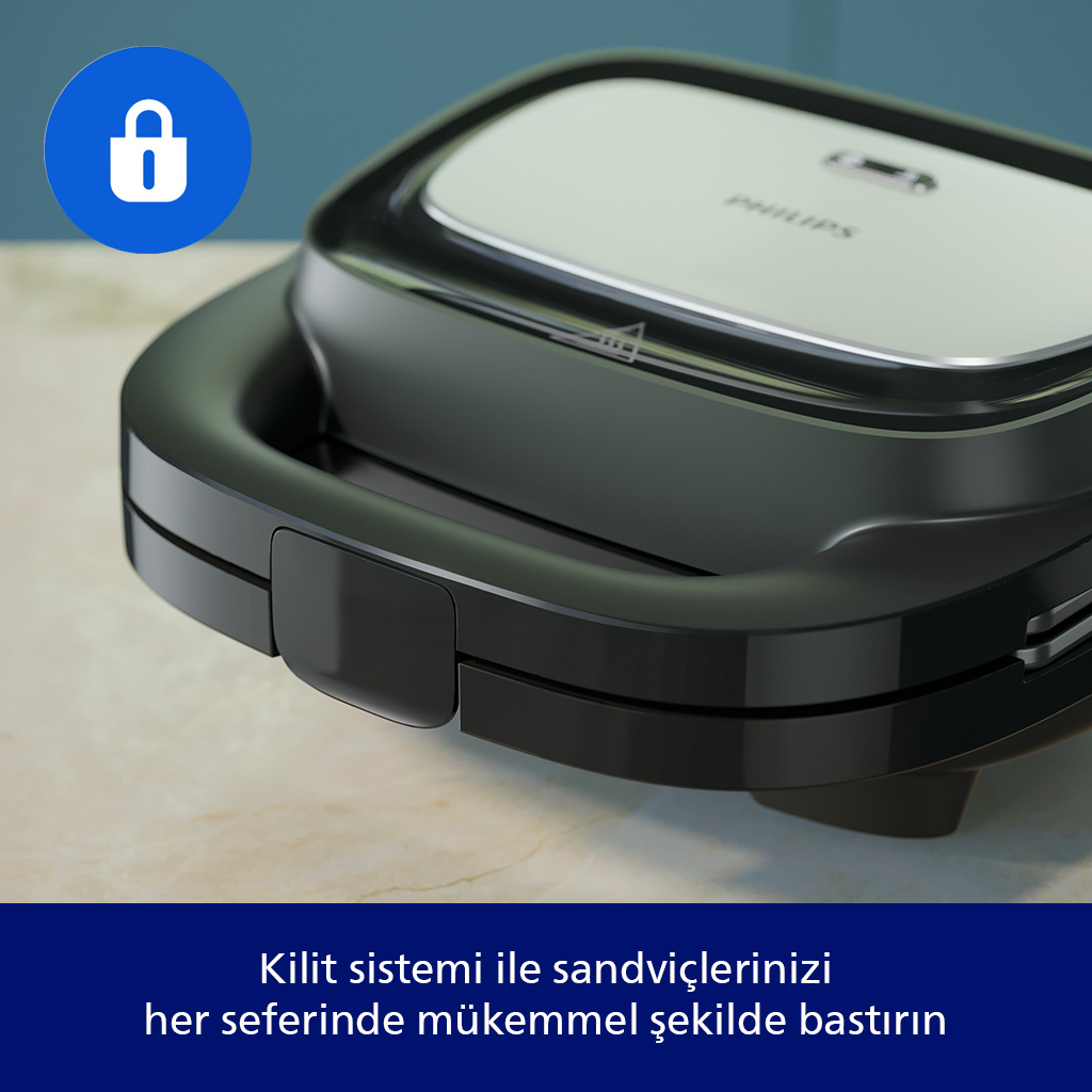 Tezgah üzerinde duran siyah ve gümüş renkli Philips tost makinesi ve kilit simgesi.