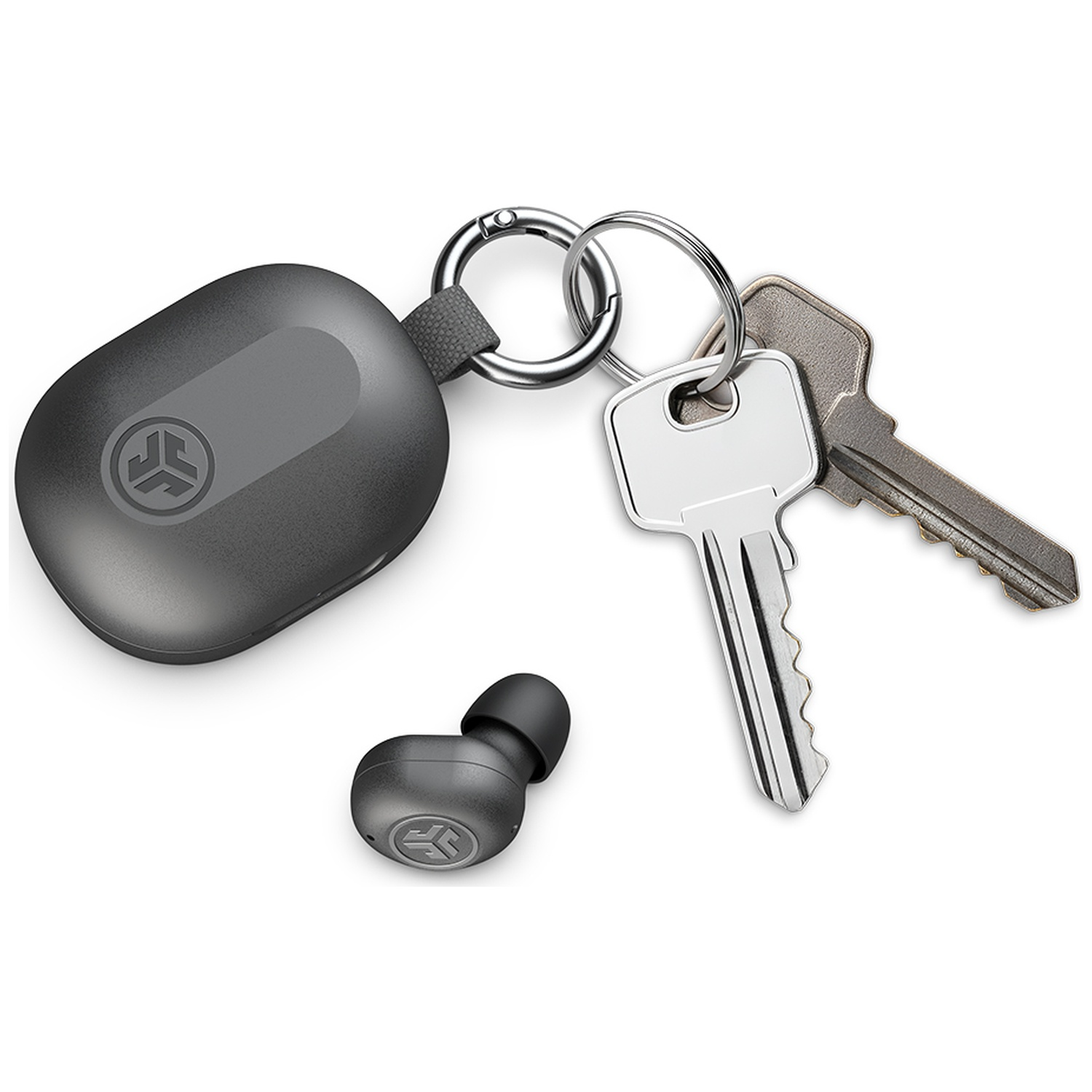 A grey earbud charging case with carabiner, two keys, and a single in-ear headphone on a white background.