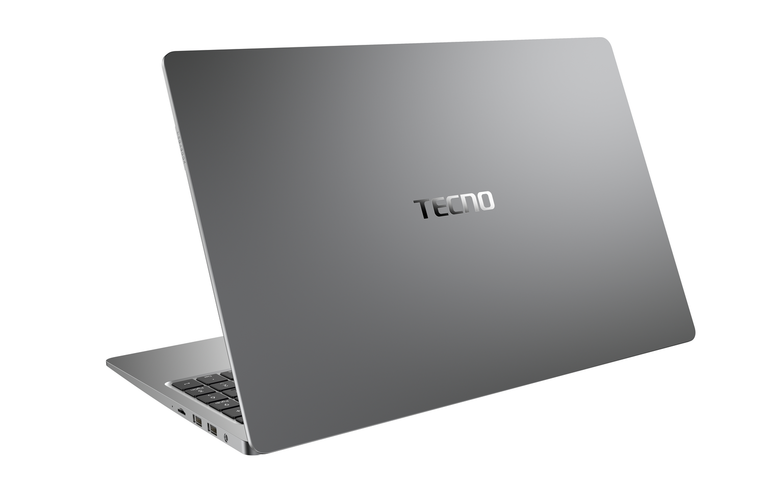 Un ordenador portátil Tecno gris cerrado se encuentra sobre una superficie blanca con el logotipo visible.